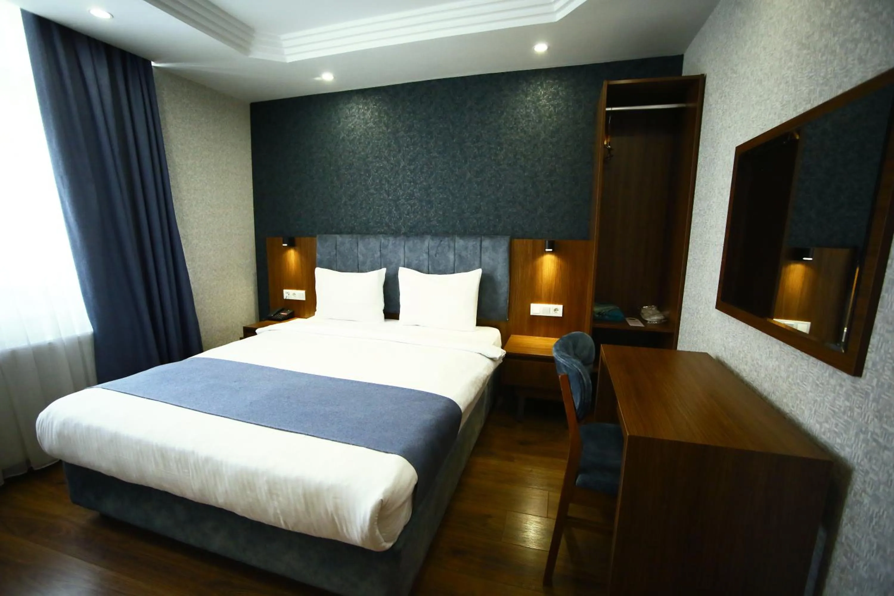 Bed in BUKAVİYYE HOTEL