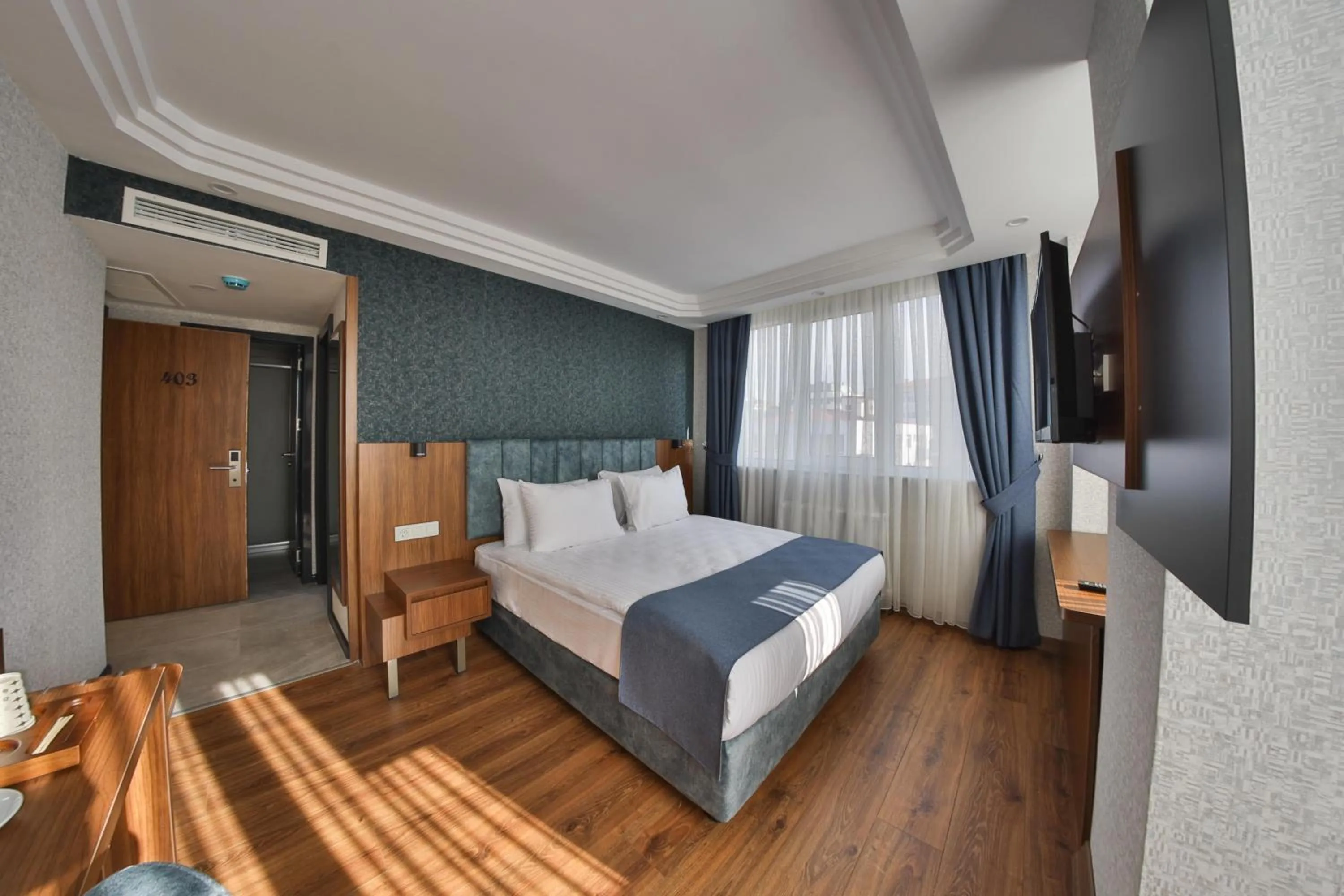 Communal lounge/ TV room, Bed in BUKAVİYYE HOTEL