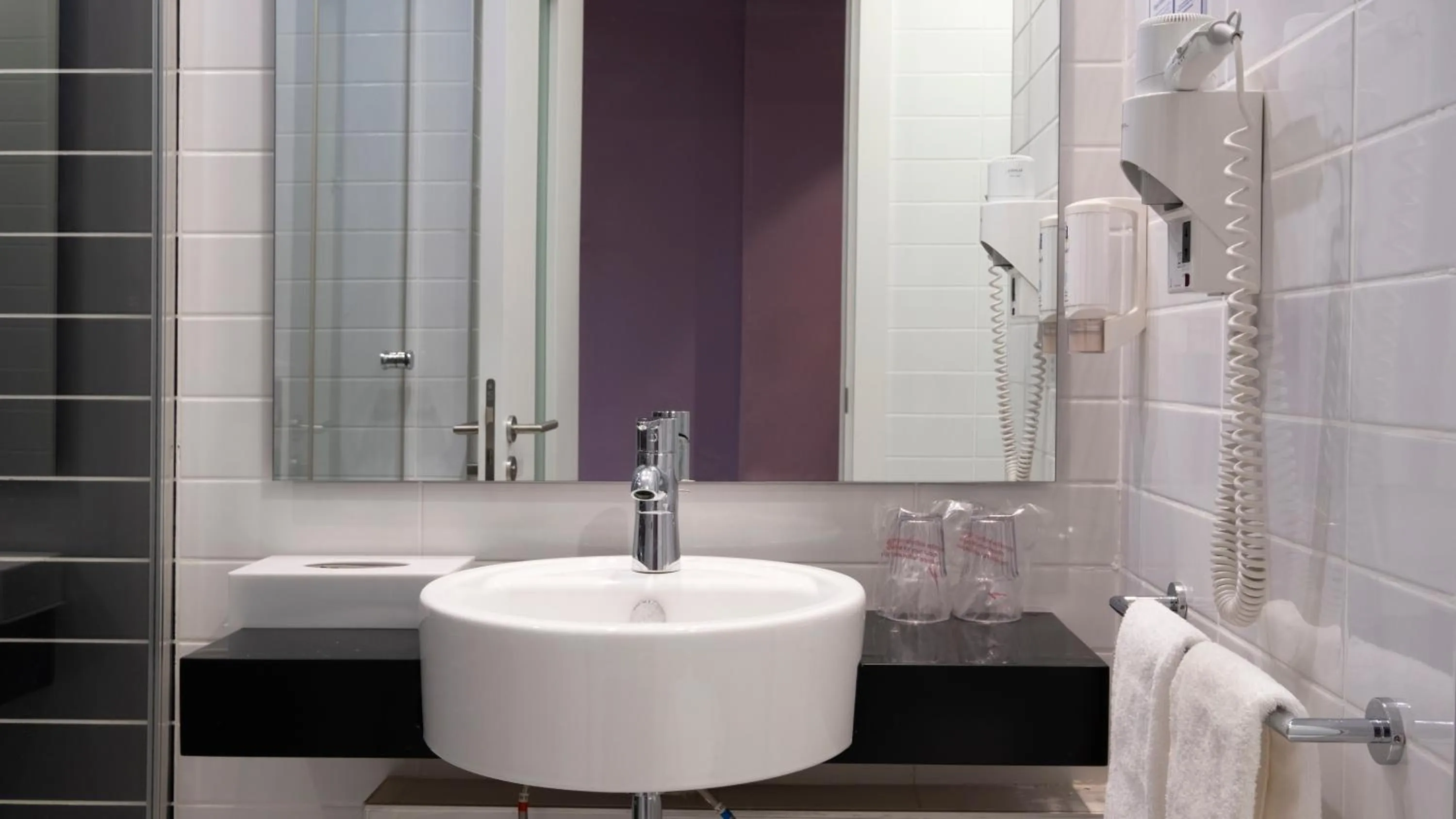 Bathroom in FEZ INN Hotel