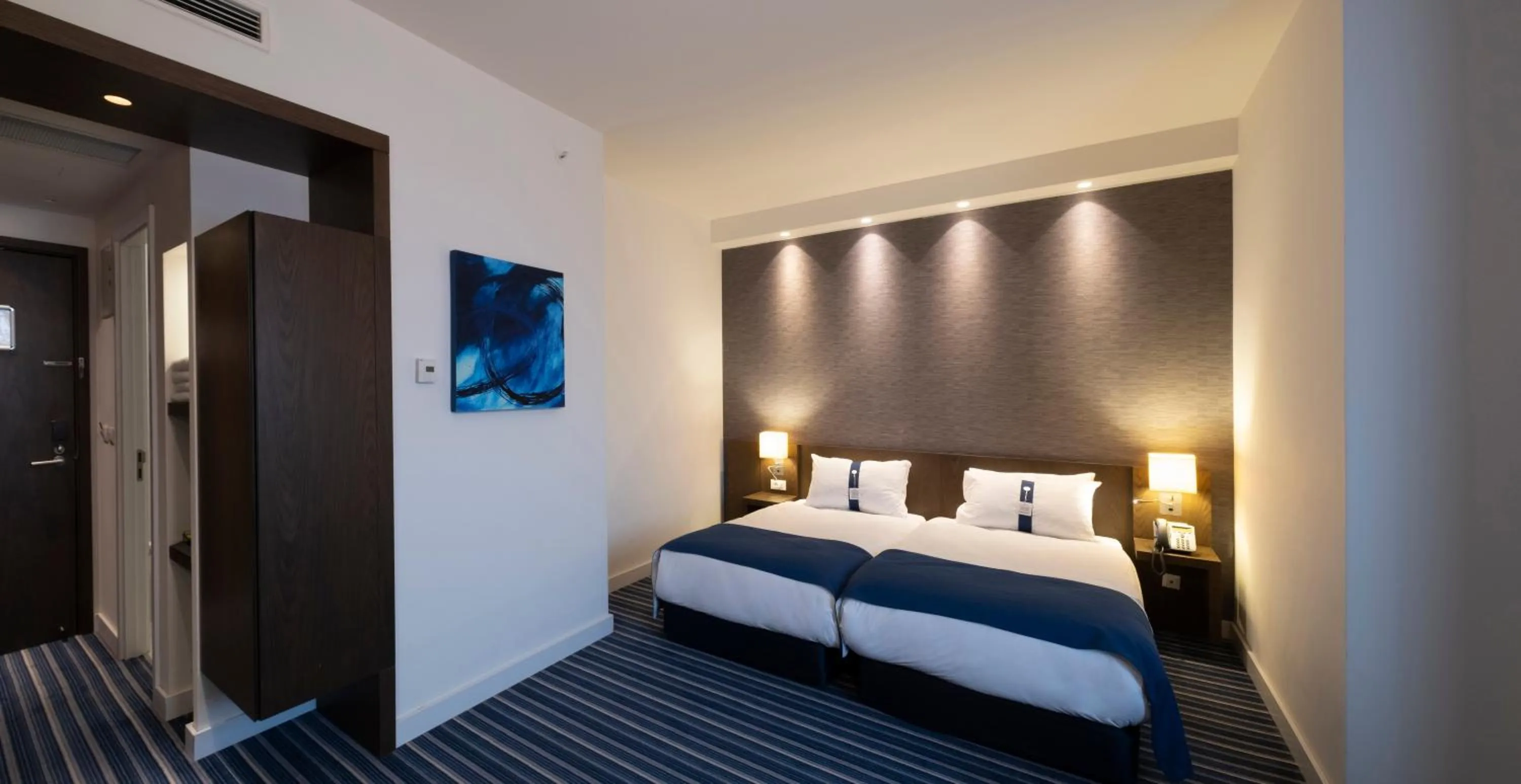 Bed in FEZ INN Hotel