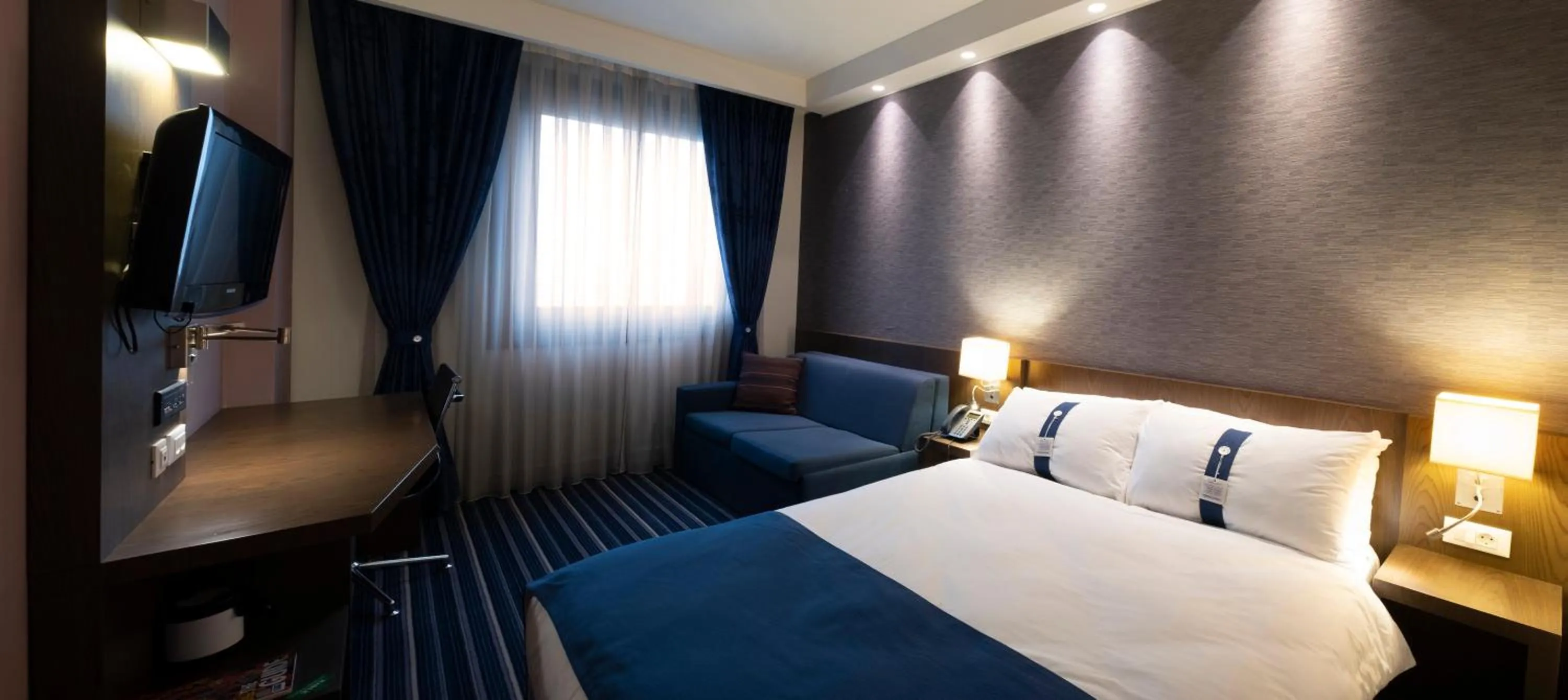 Bed in FEZ INN Hotel