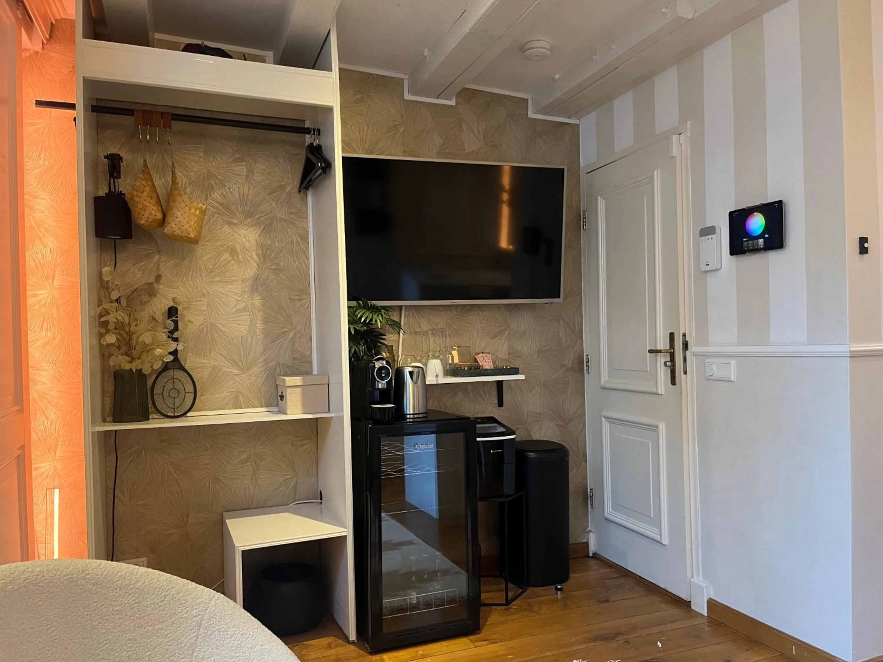 TV and multimedia in The Enlightened House Luxury Suites