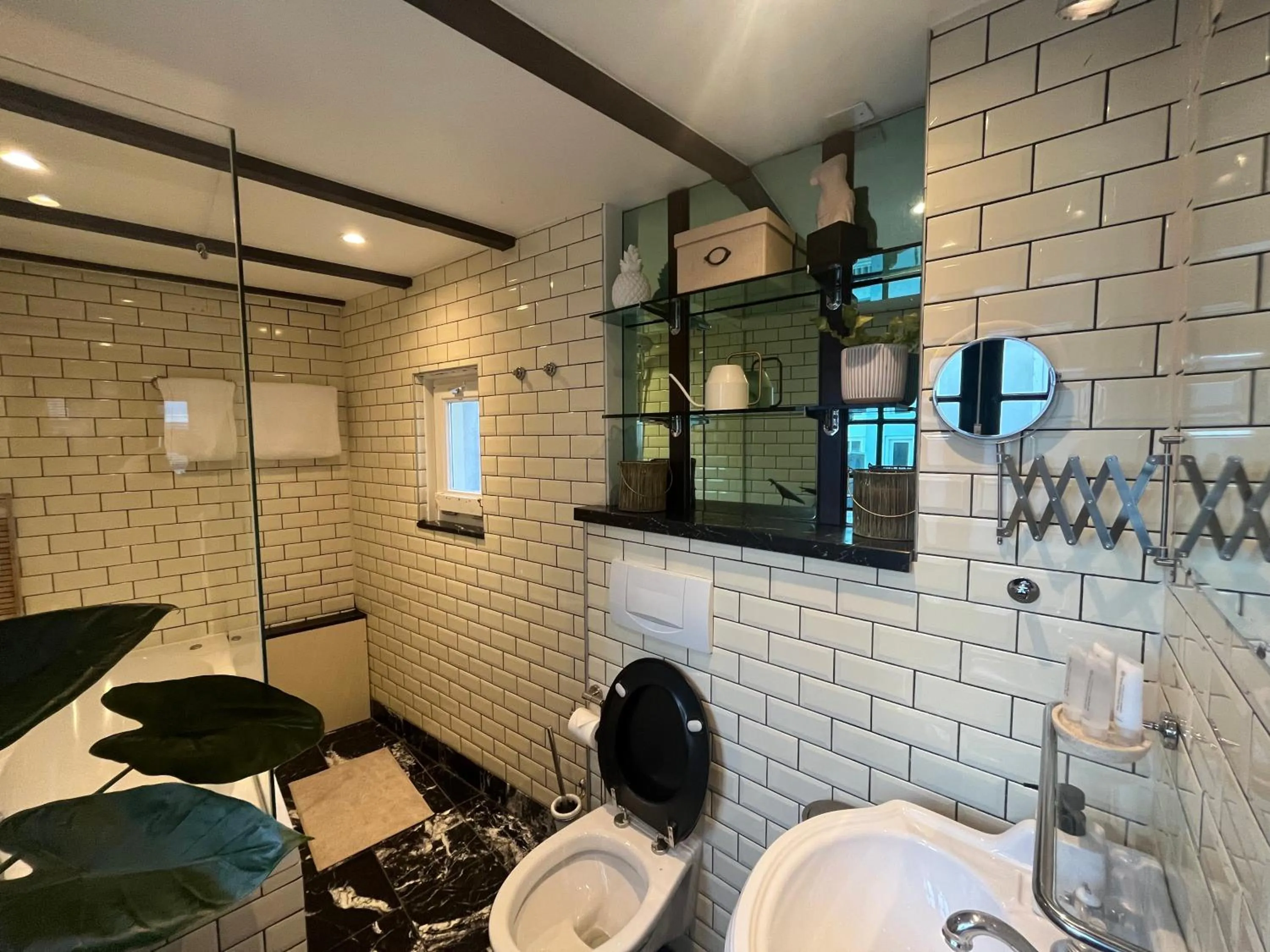 Shower in The Enlightened House Luxury Suites