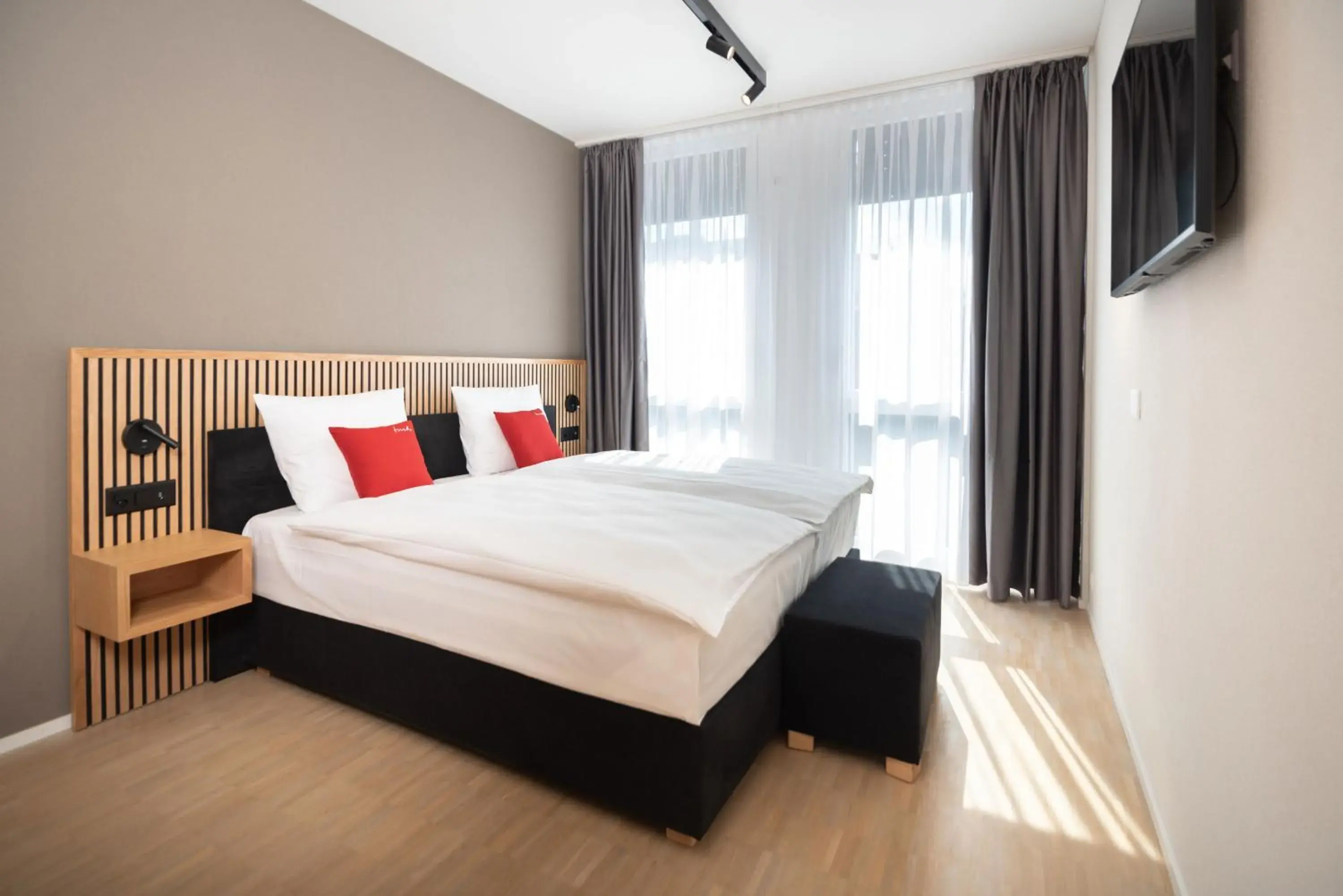 View (from property/room), Bed in Tailormade Hotel BAB Bachenbülach View (from property/room), Bed in Tailormade Hotel BAB Bachenbülach