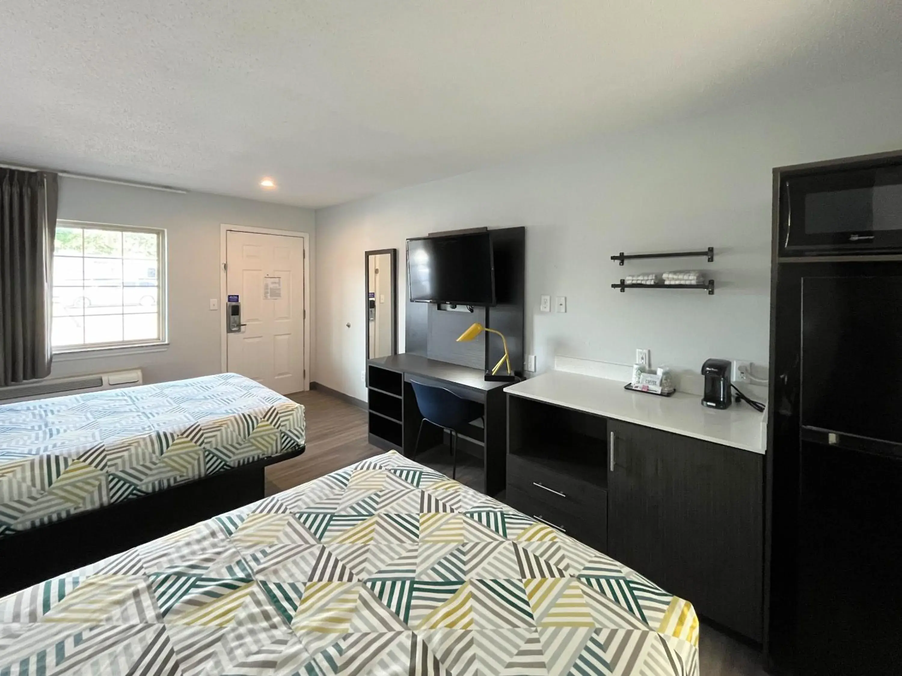 Kitchen or kitchenette, Bed in Studio 6 Suites Lafayette, IN