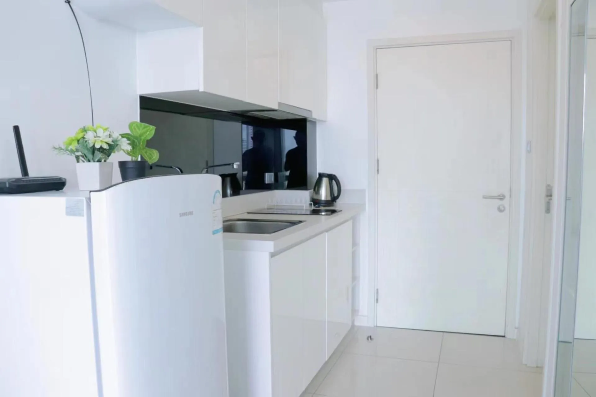 Kitchen or kitchenette in City Center Residence & Hot Hot Hot