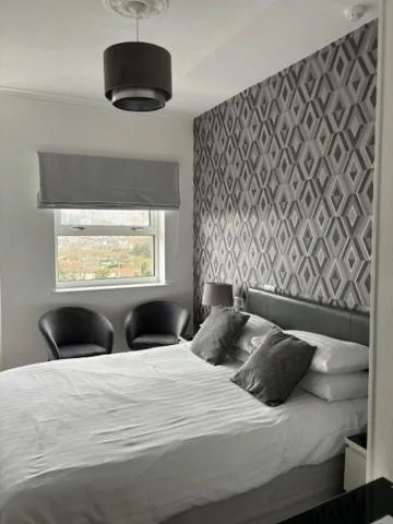 Bed in The Sandpiper Guest House