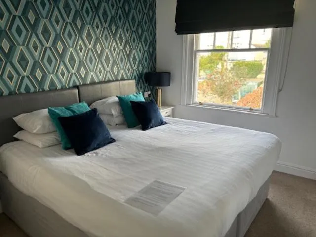 Bed in The Sandpiper Guest House