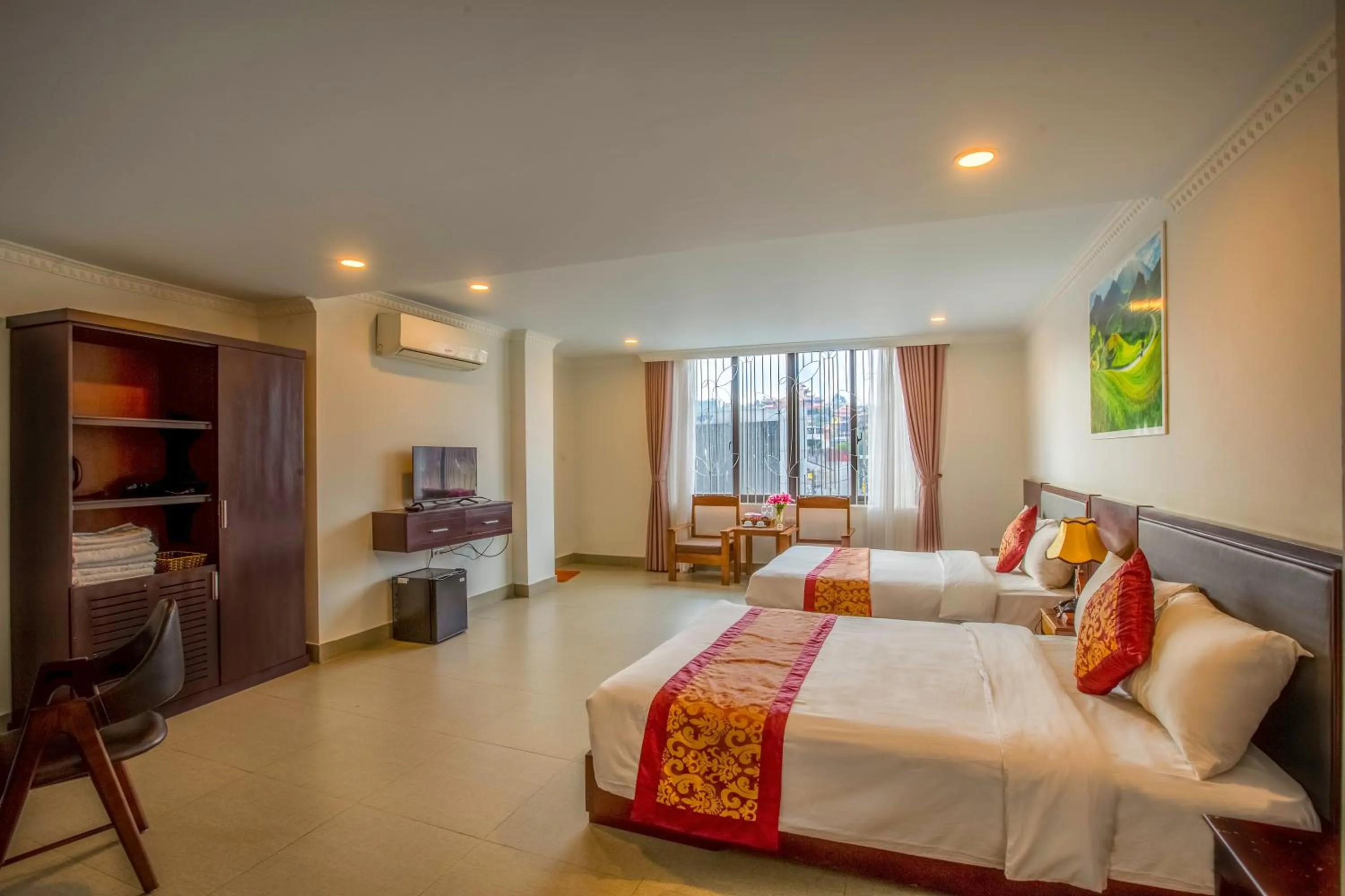 Bed in Grand Flamant Hotel Sapa