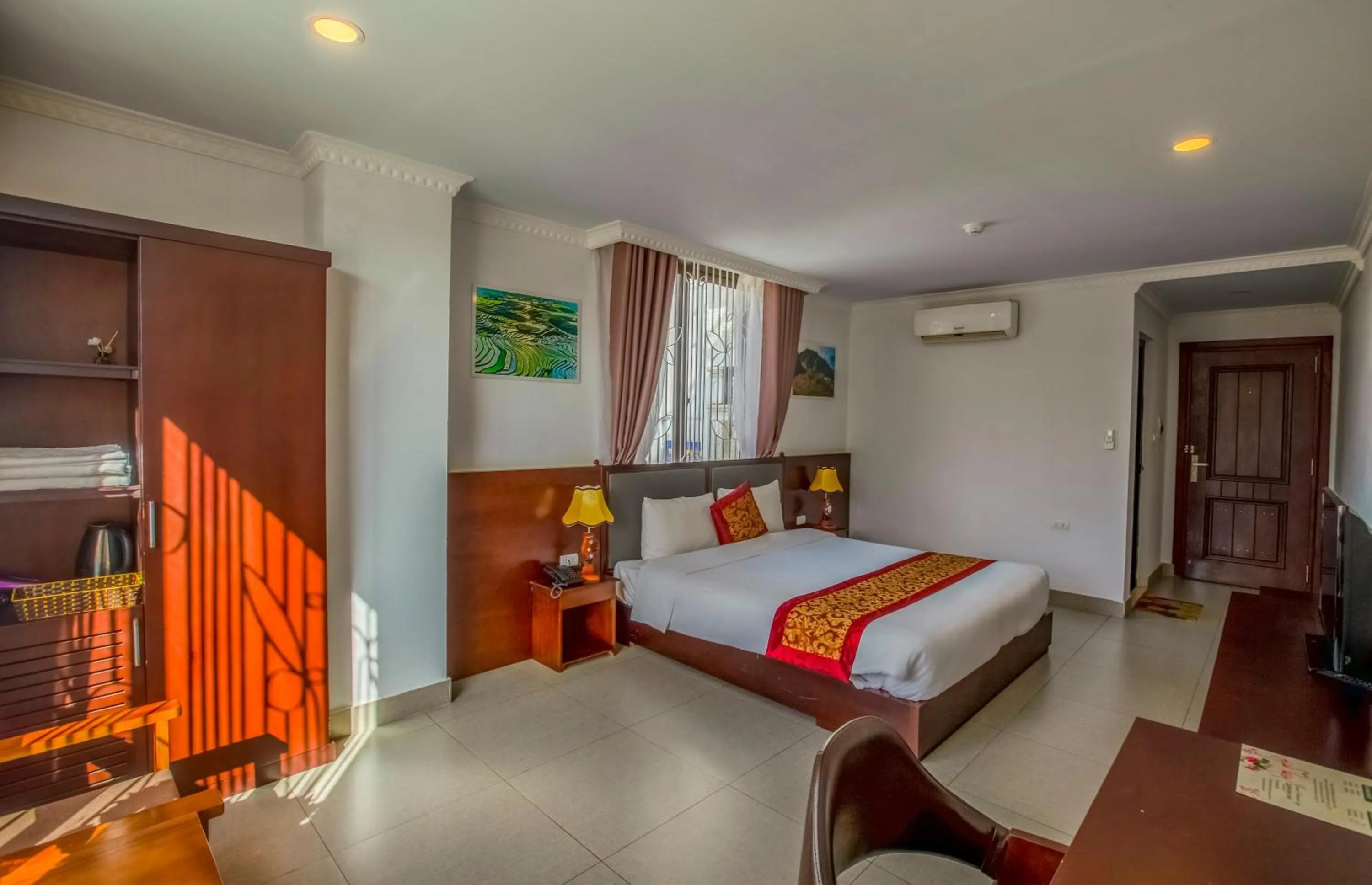 Bed in Grand Flamant Hotel Sapa