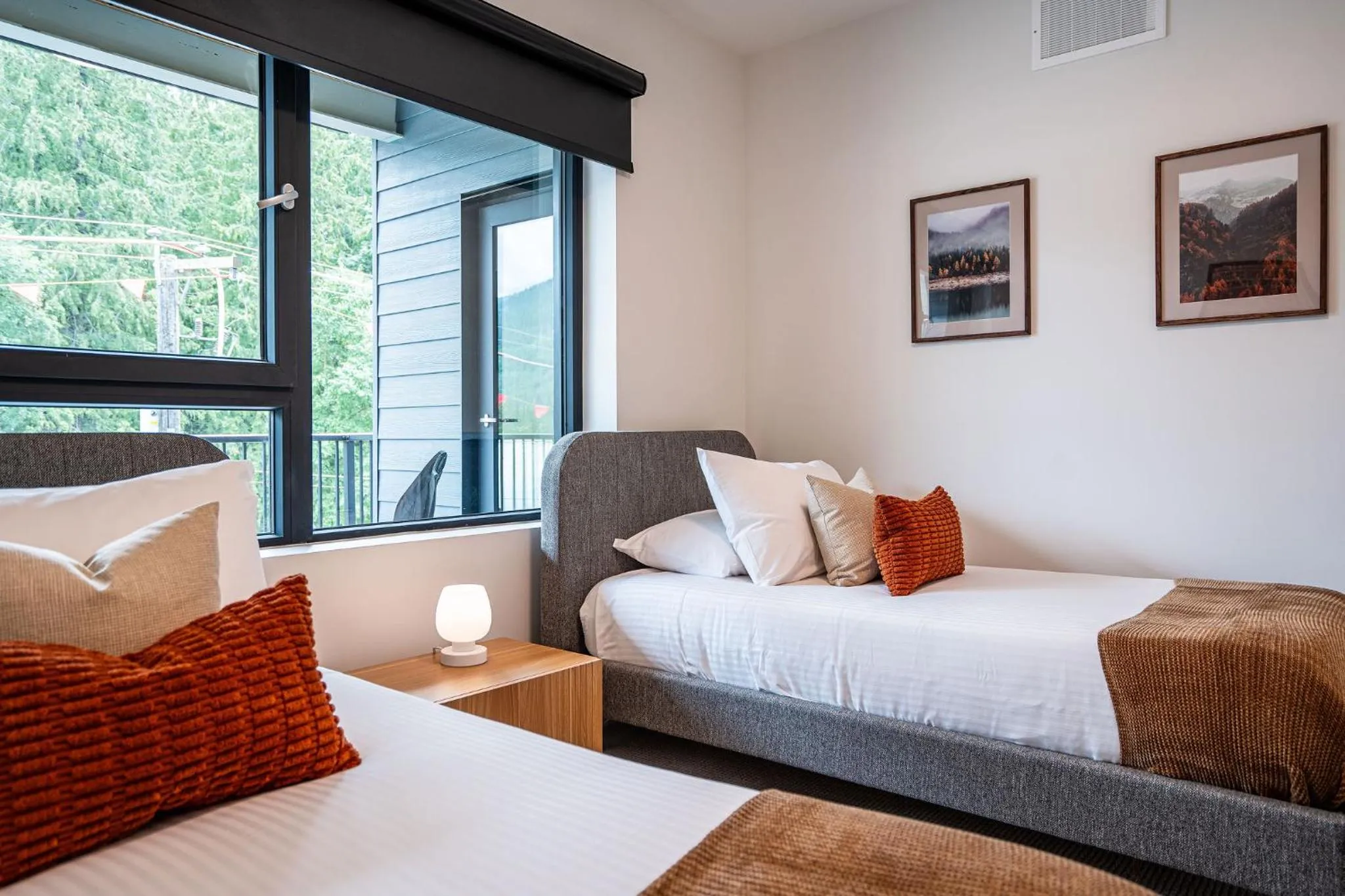 Bed in Serenity Now by Revelstoke Vacations