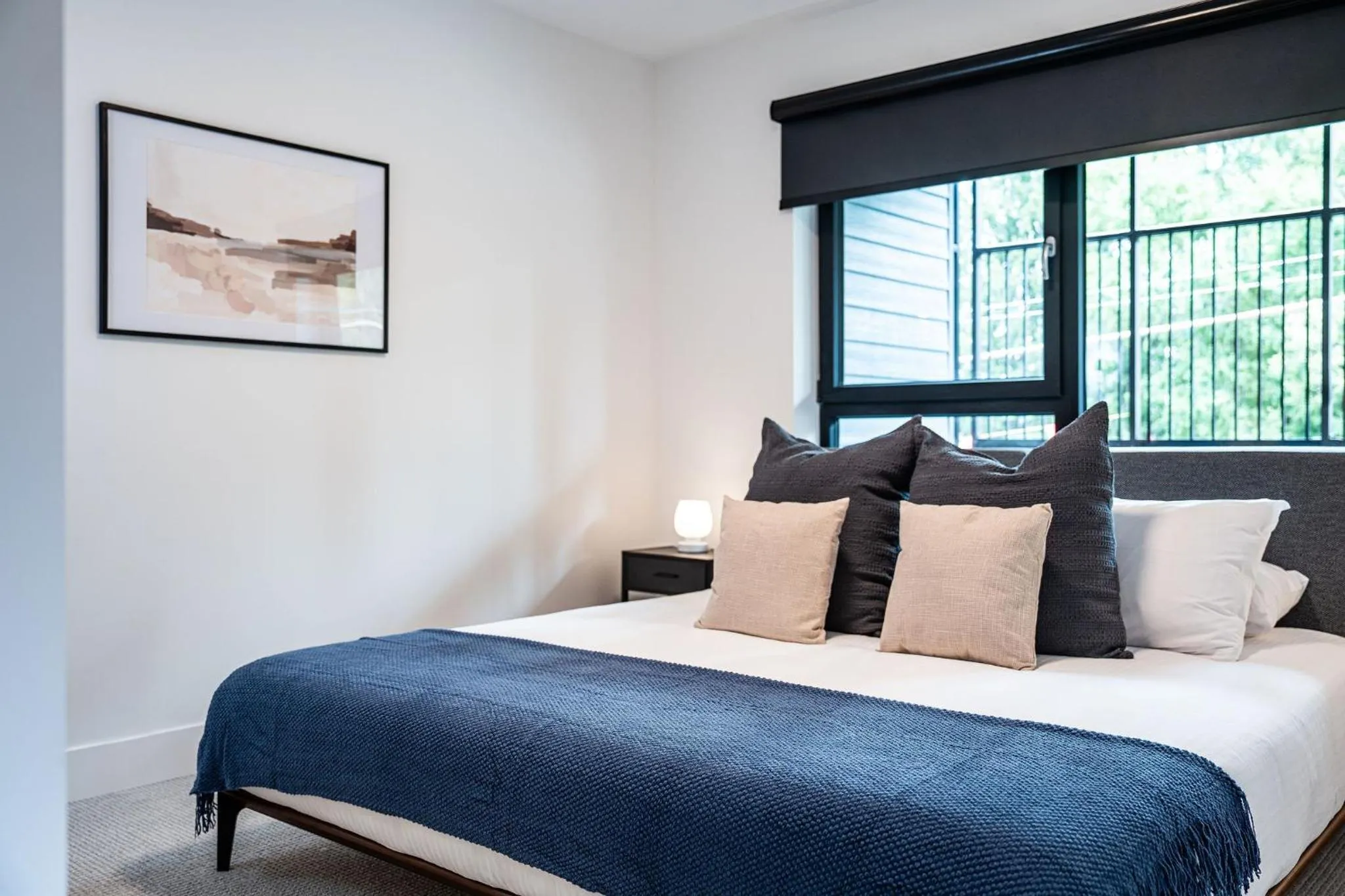 Bed in Serenity Now by Revelstoke Vacations