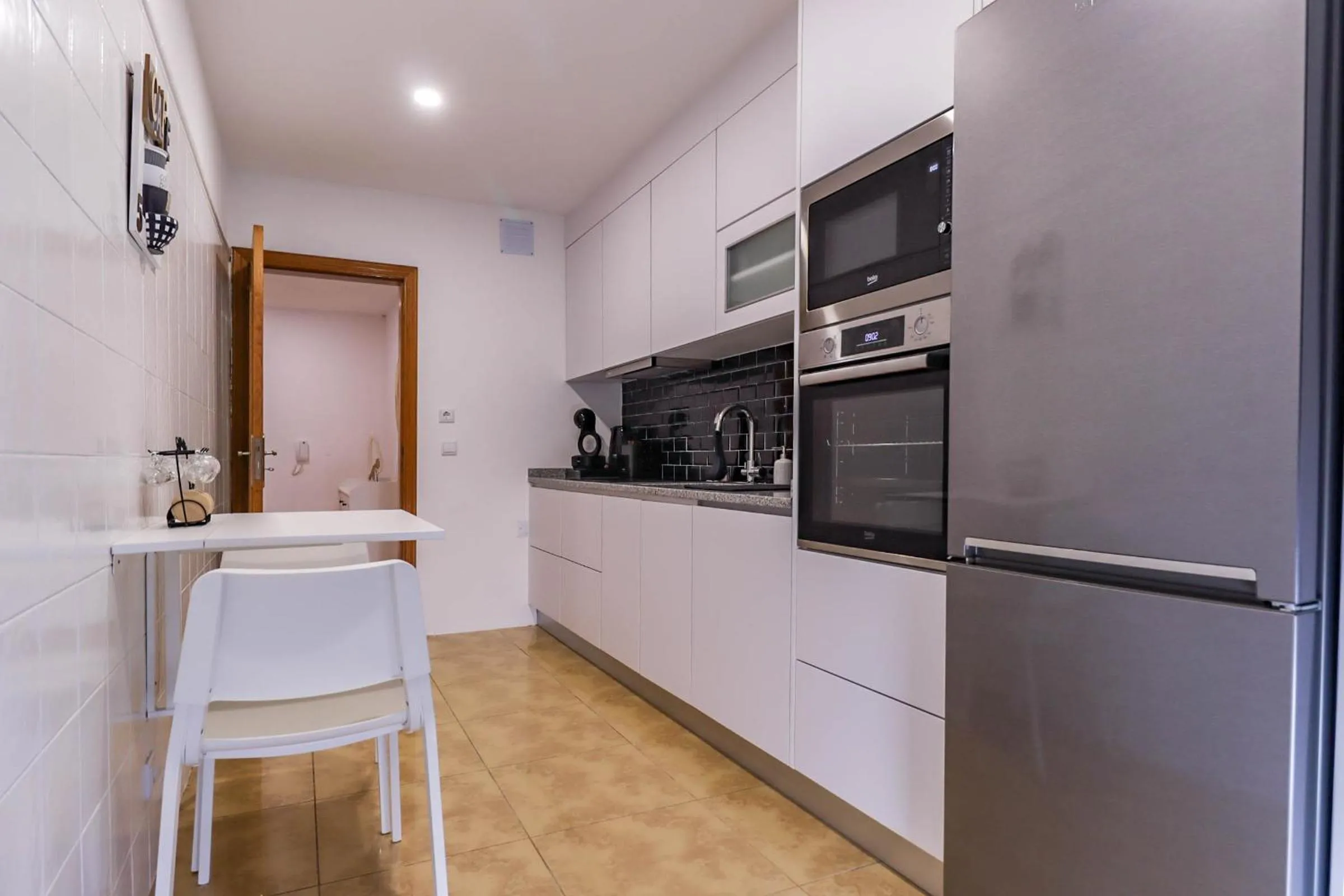 Kitchen or kitchenette in Flor do Mar - Spacious Apartment with Balcony