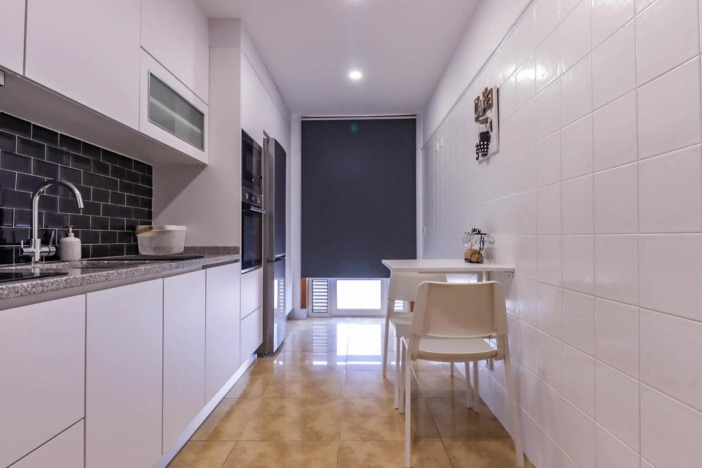 Kitchen or kitchenette in Flor do Mar - Spacious Apartment with Balcony