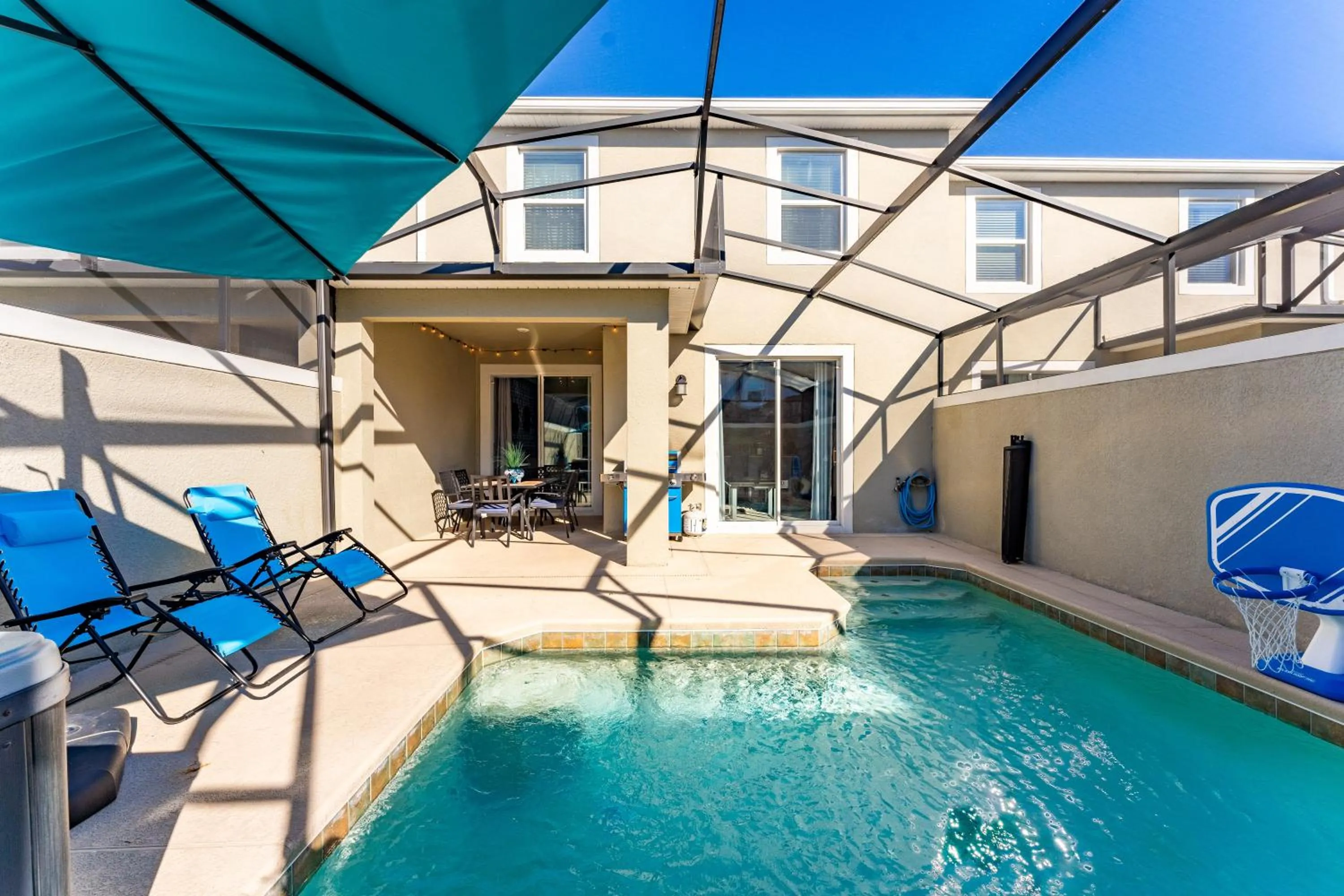 Patio in Family Retreat near Disney with Pool & Hot Tub!