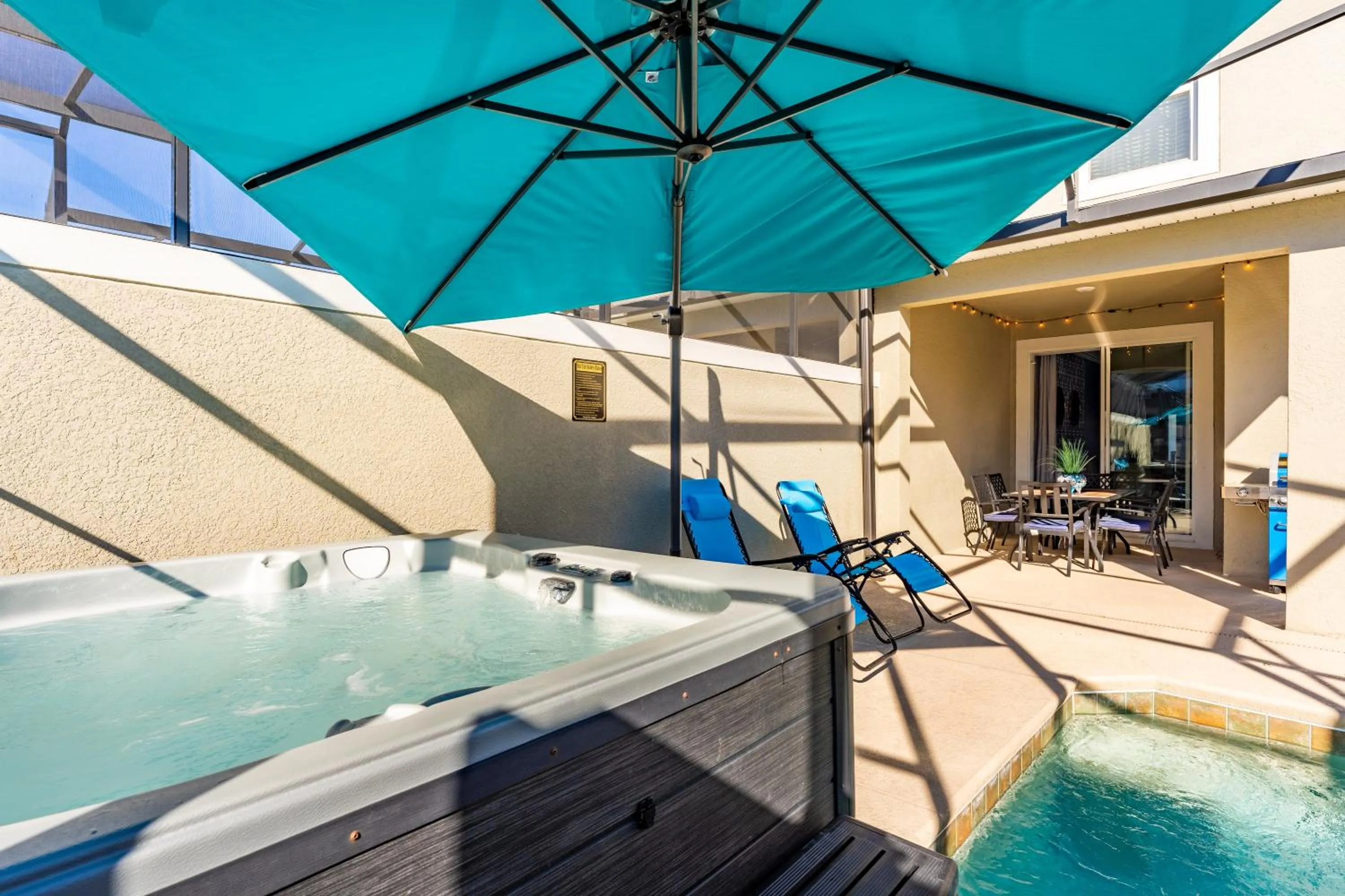 Patio in Family Retreat near Disney with Pool & Hot Tub!