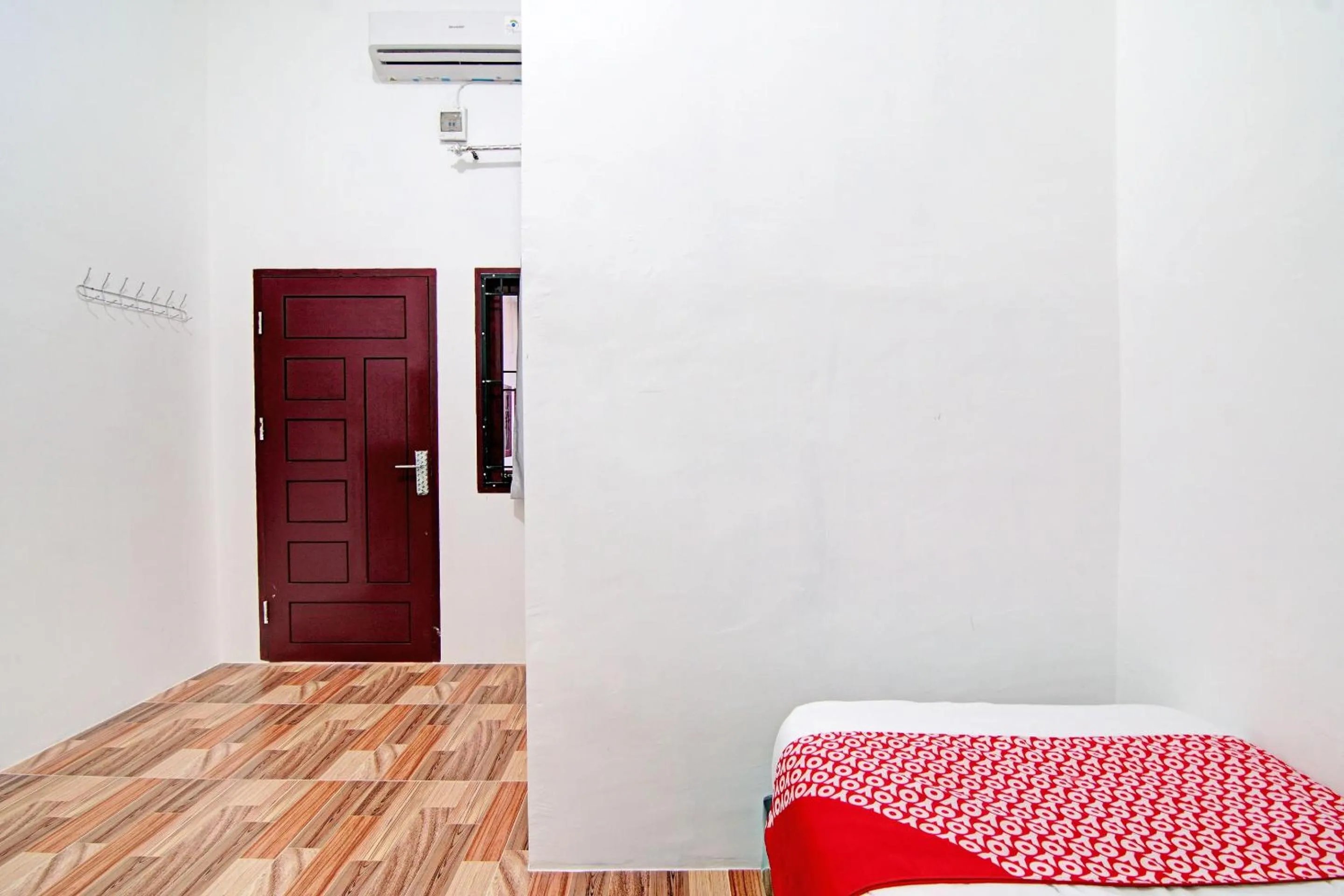 Bedroom in OYO 92946 Dekna Homestay Syariah