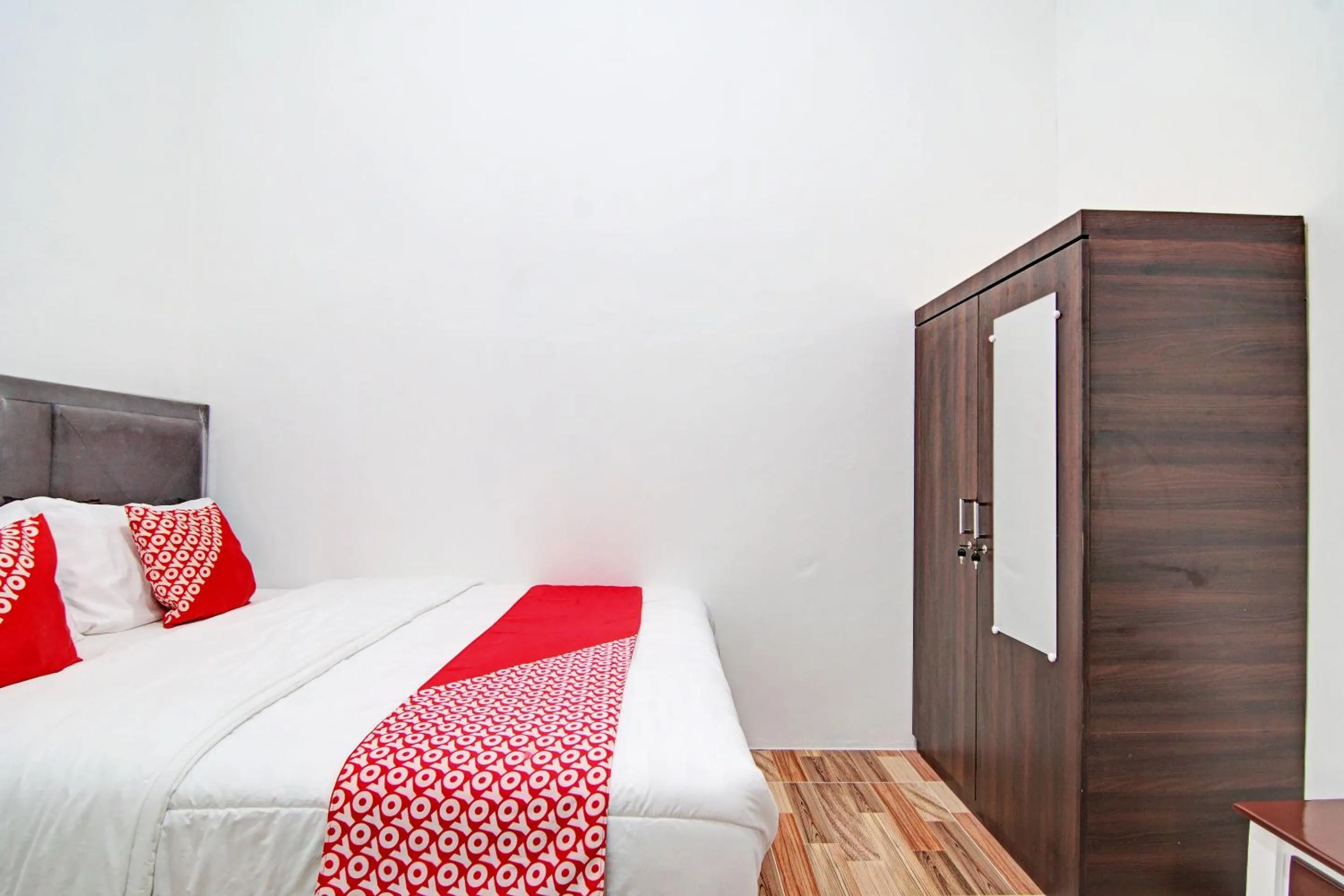 Bedroom in OYO 92946 Dekna Homestay Syariah