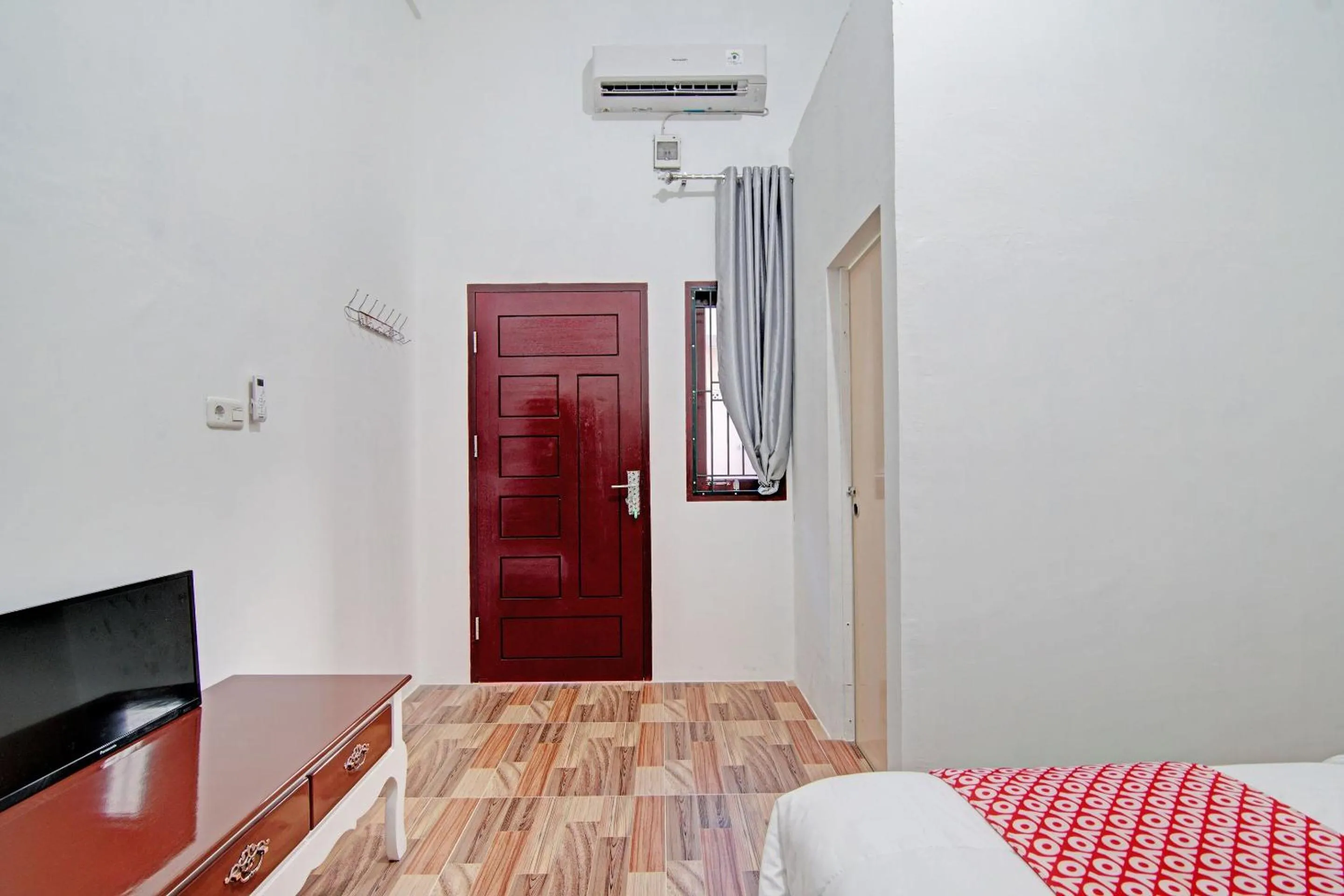 Bedroom in OYO 92946 Dekna Homestay Syariah