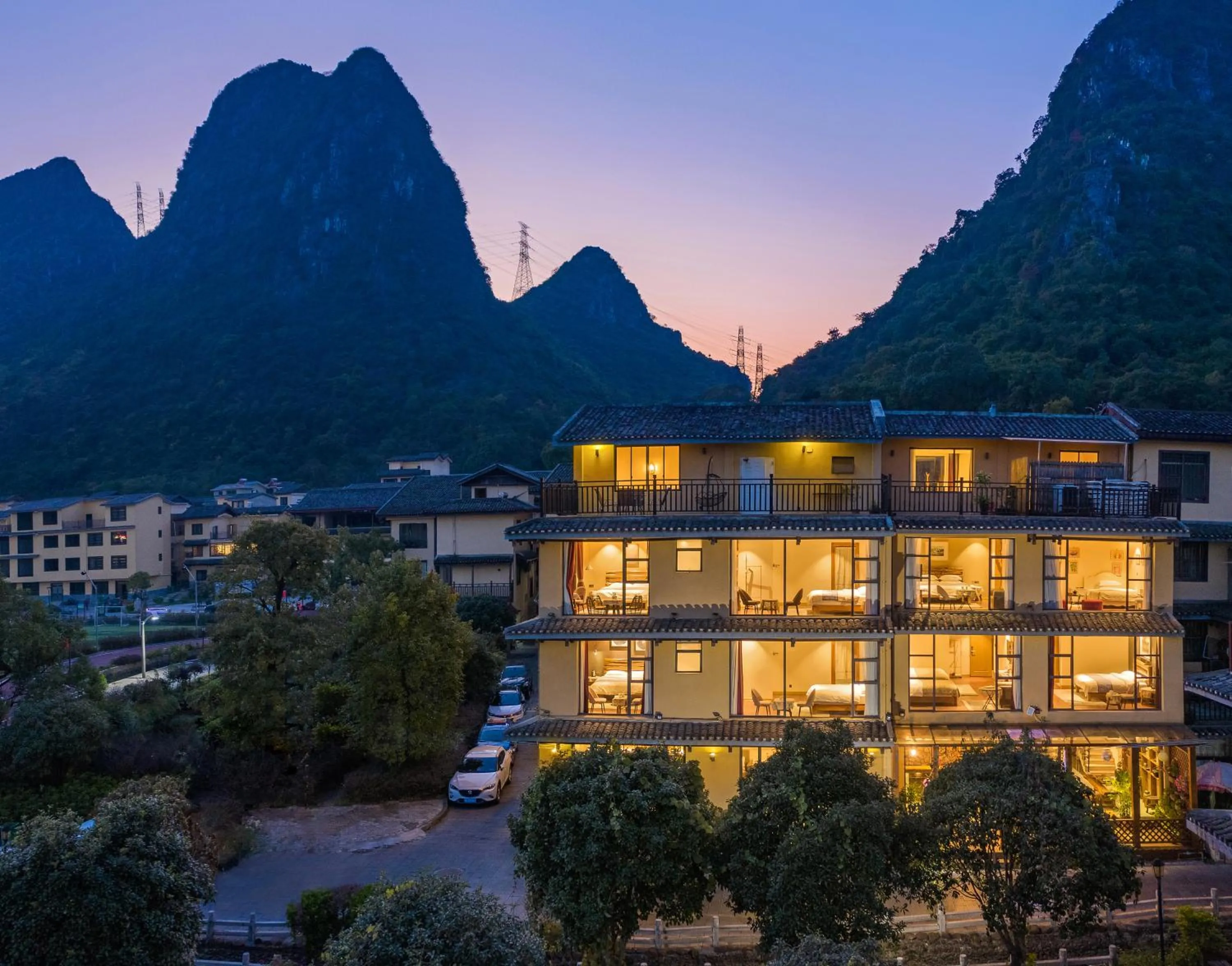 Property building in Guilin Village Creek Inn -Beside the lake &Fee pick up service over three nights