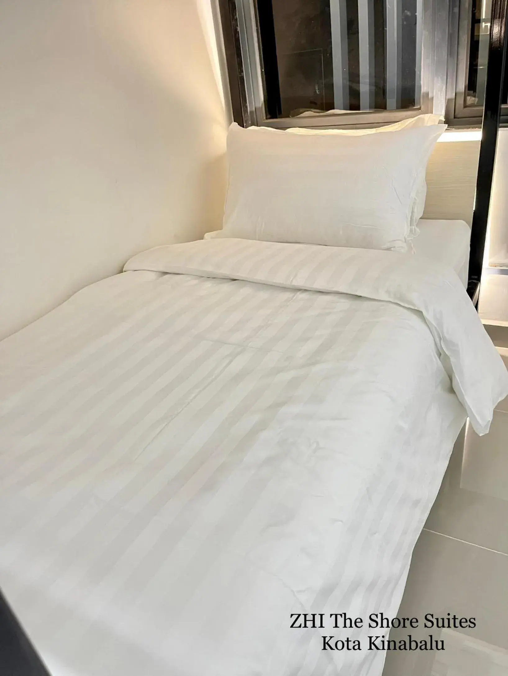 Bed in ZHI The Shore Suites Kota Kinabalu Bed in ZHI The Shore Suites Kota Kinabalu