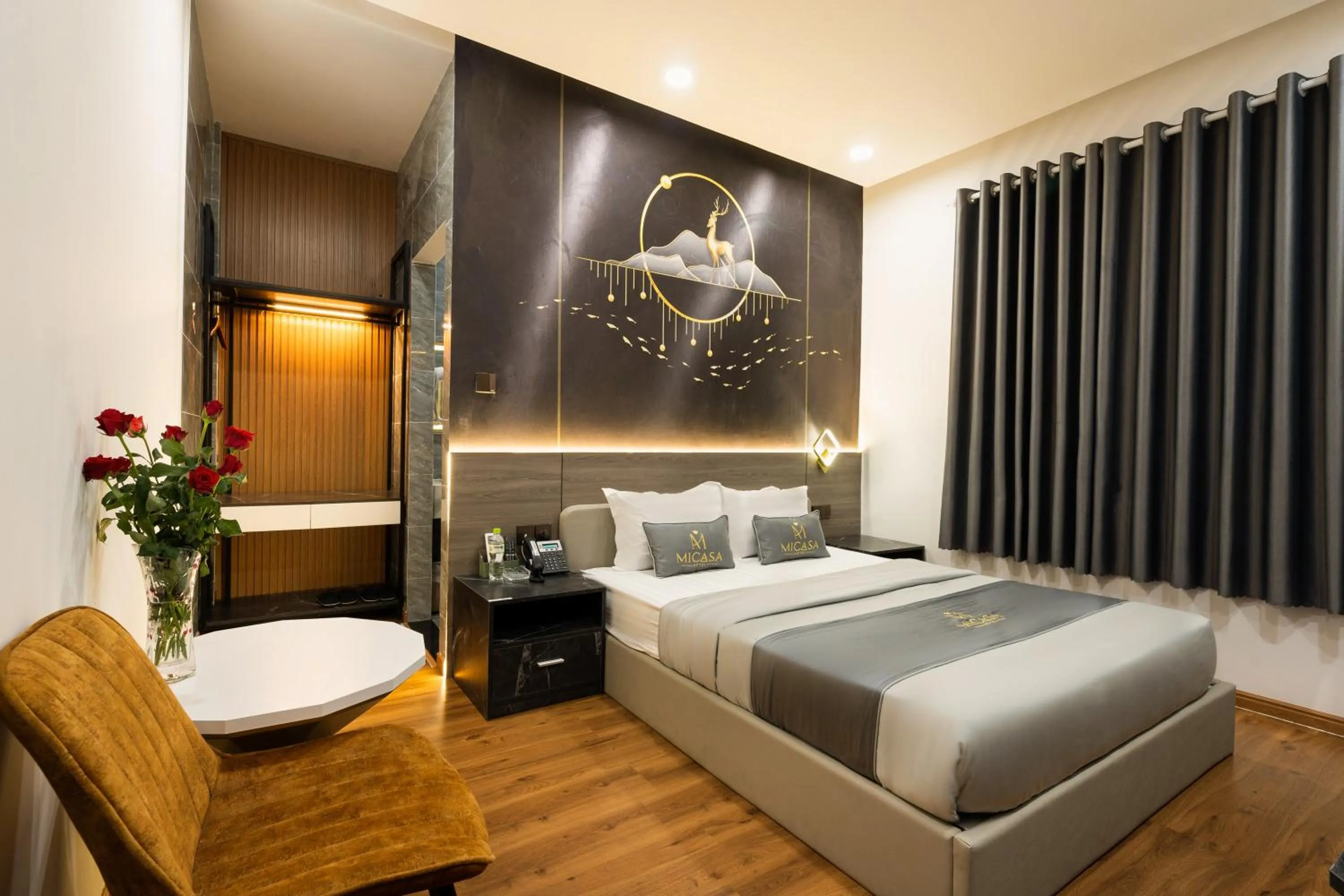 Seating area, Bed in MICASA HOTEL