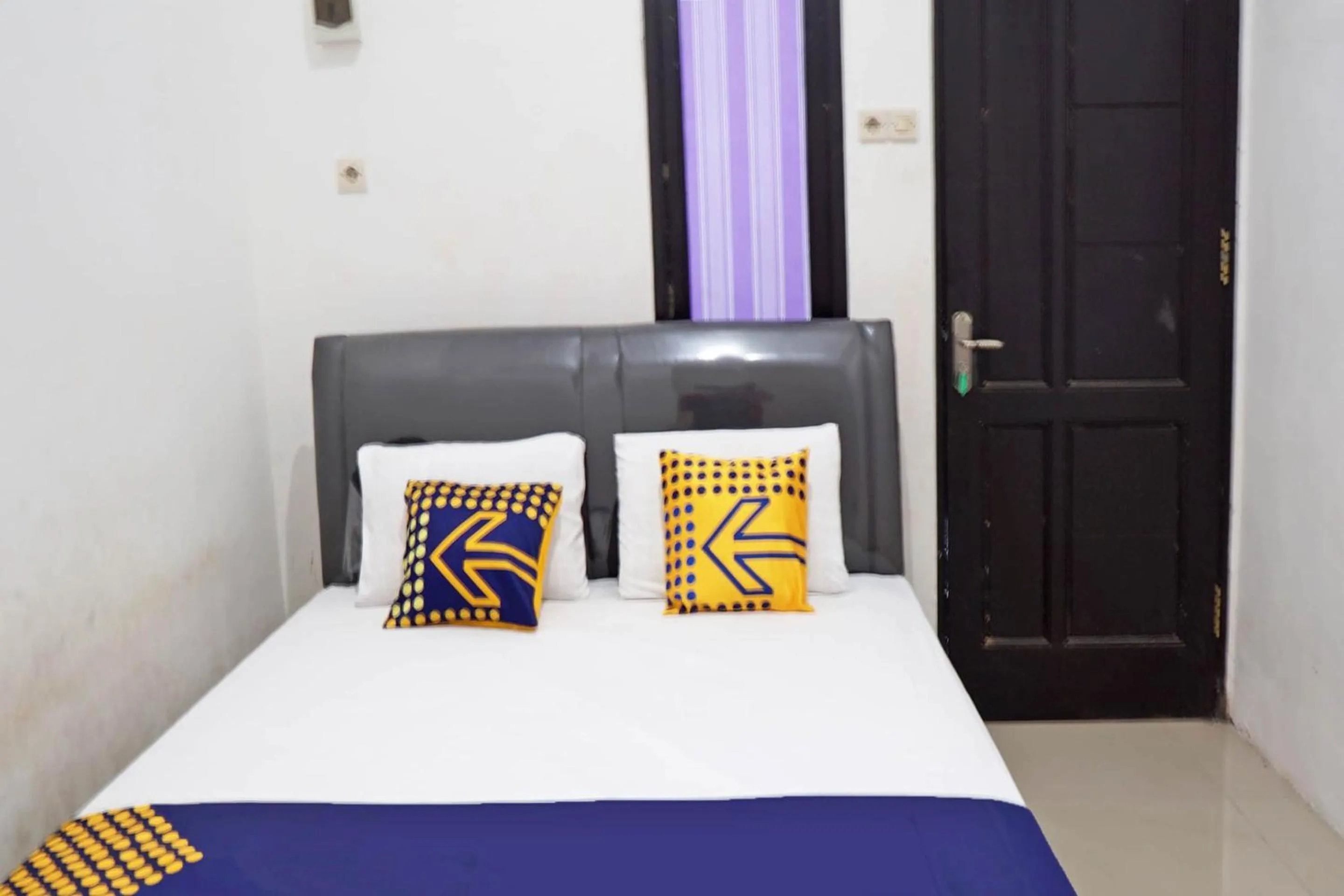 Bedroom, Bed in Hotel O Kost Putih Syariah