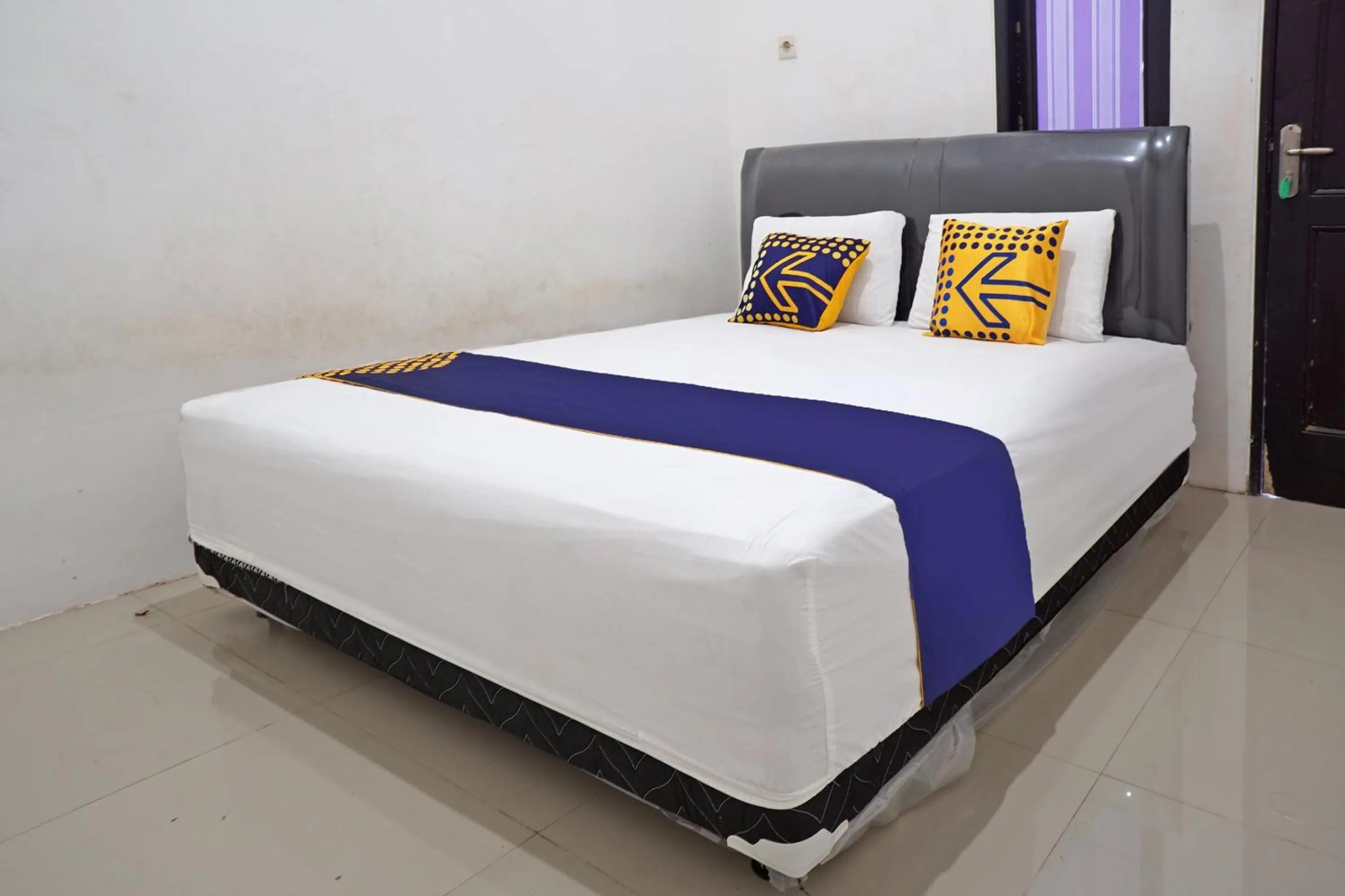 Bedroom, Bed in Hotel O Kost Putih Syariah