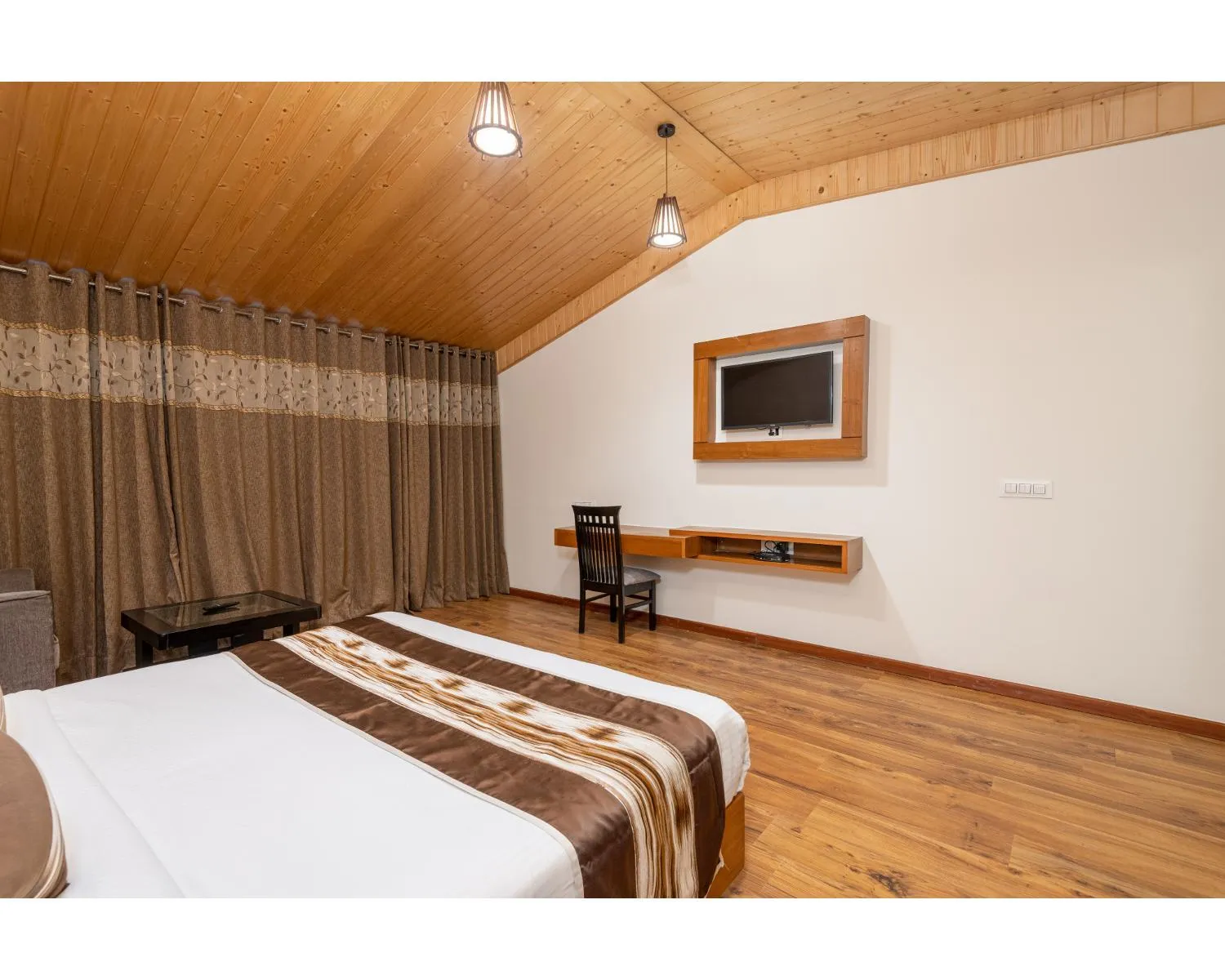 Bed, TV/Entertainment Center in The Serenity Resort Spa