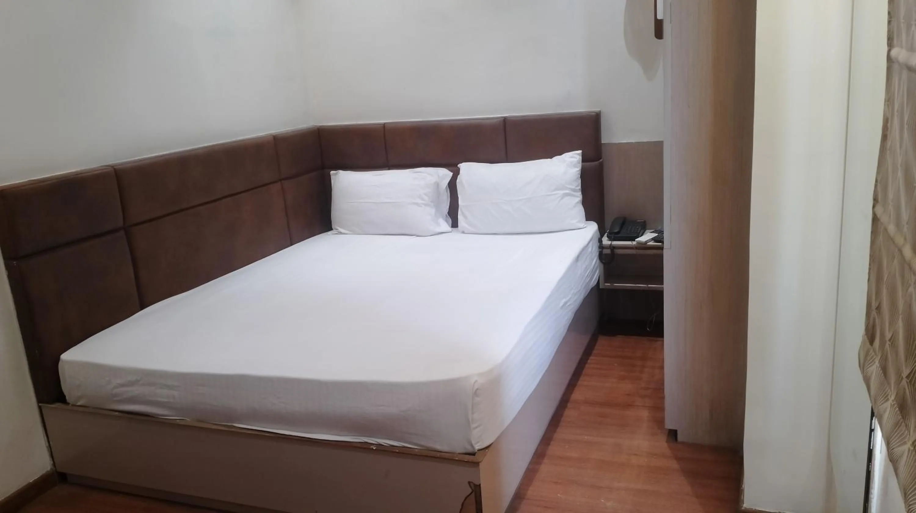 Bedroom in Buddha Stays