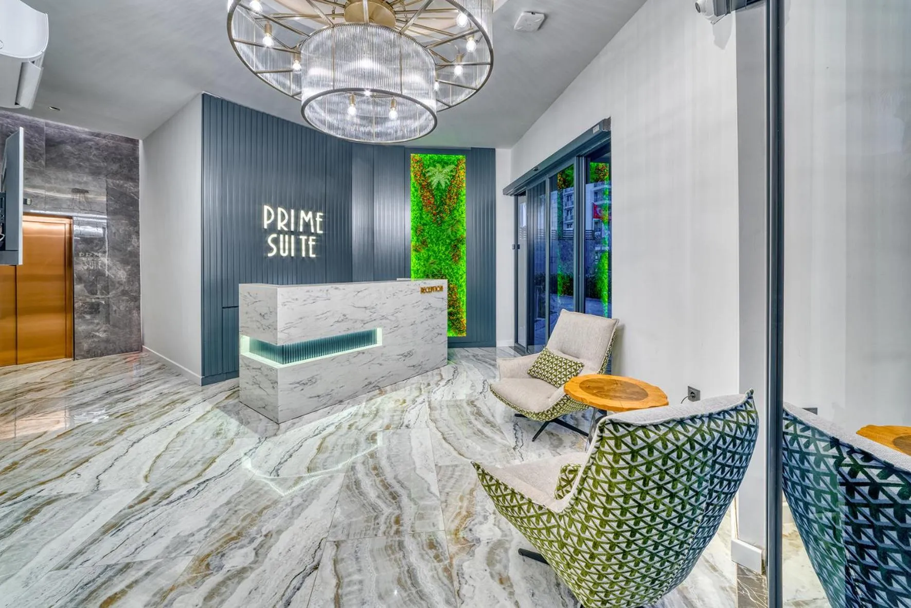 Seating area, Bed in Prime Suite