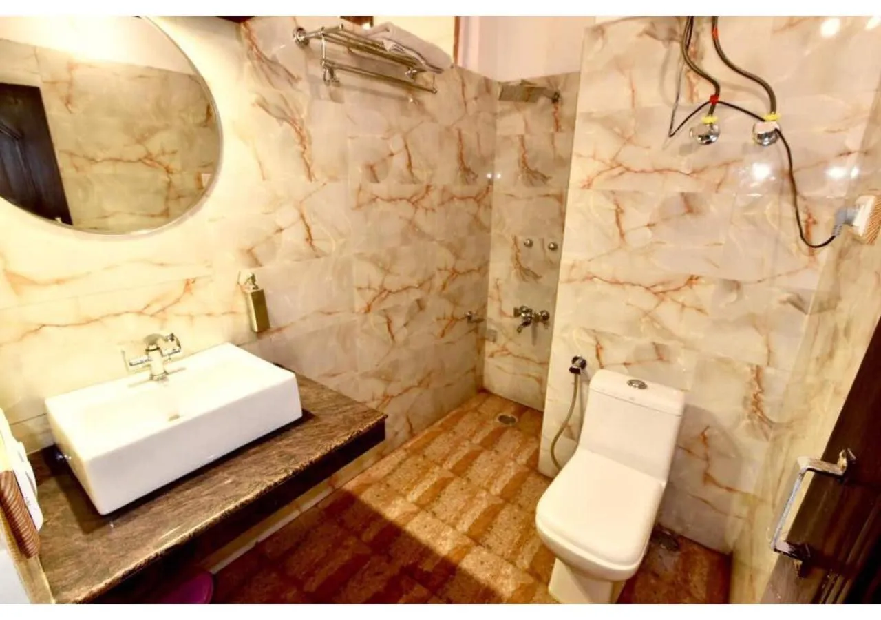 Bathroom in Hotel Devlok By DLS Hotels