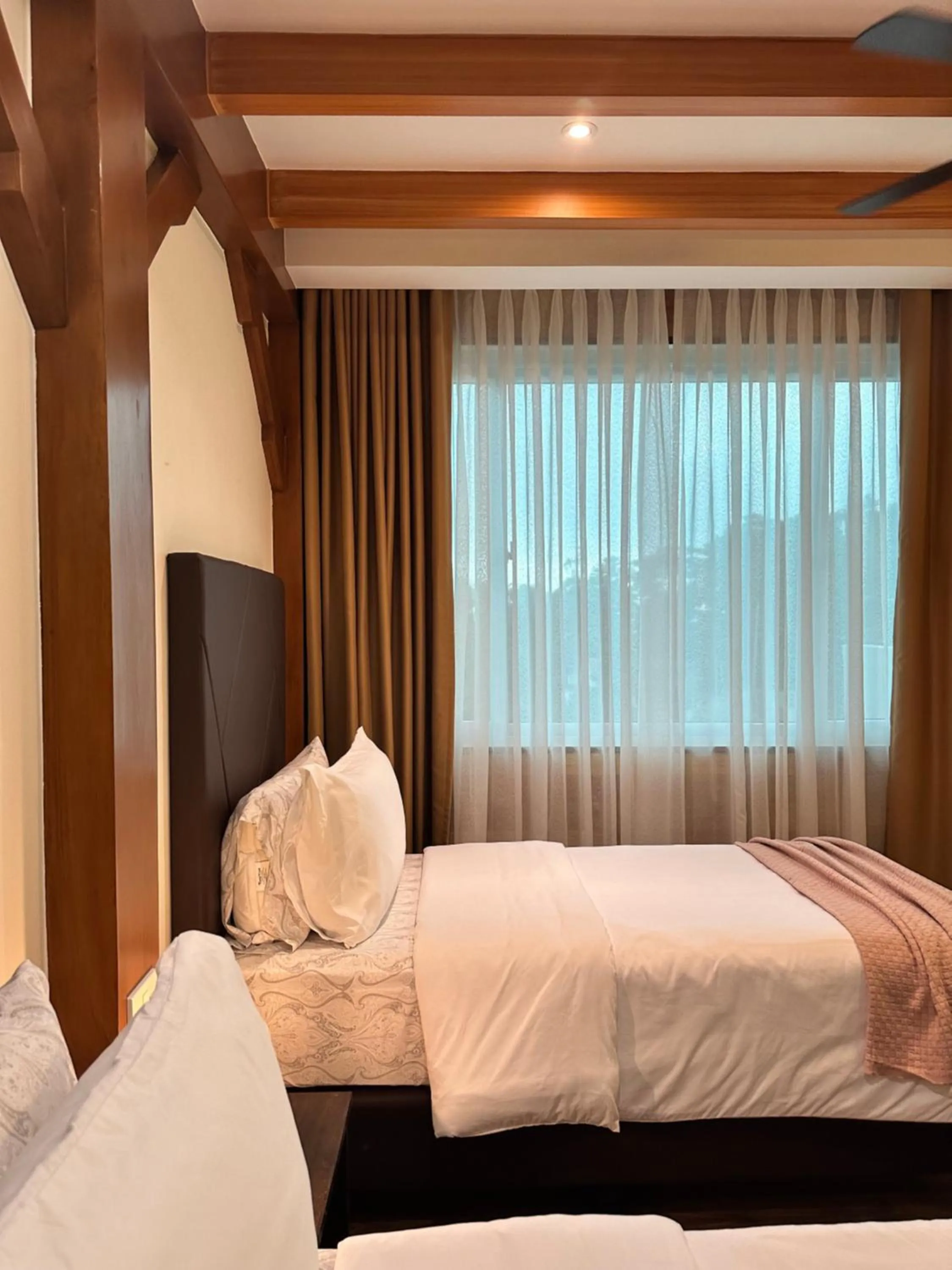 Bed in Lee Boutique Hotel Baguio