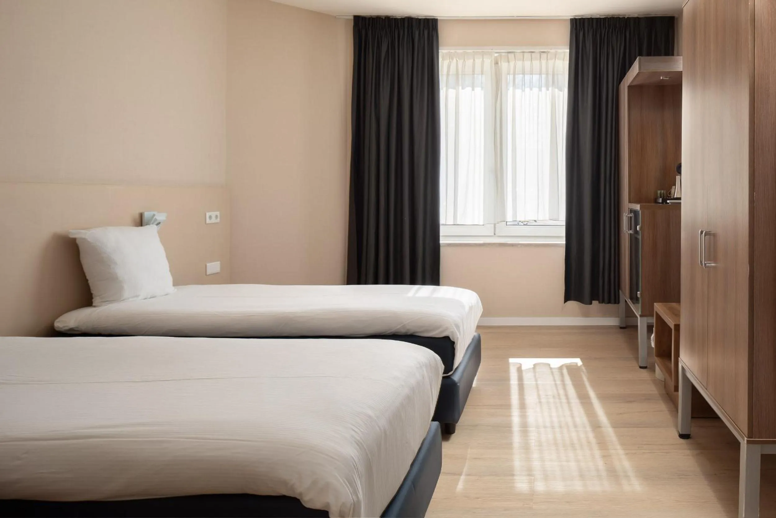 Bed in Hotel Victorie