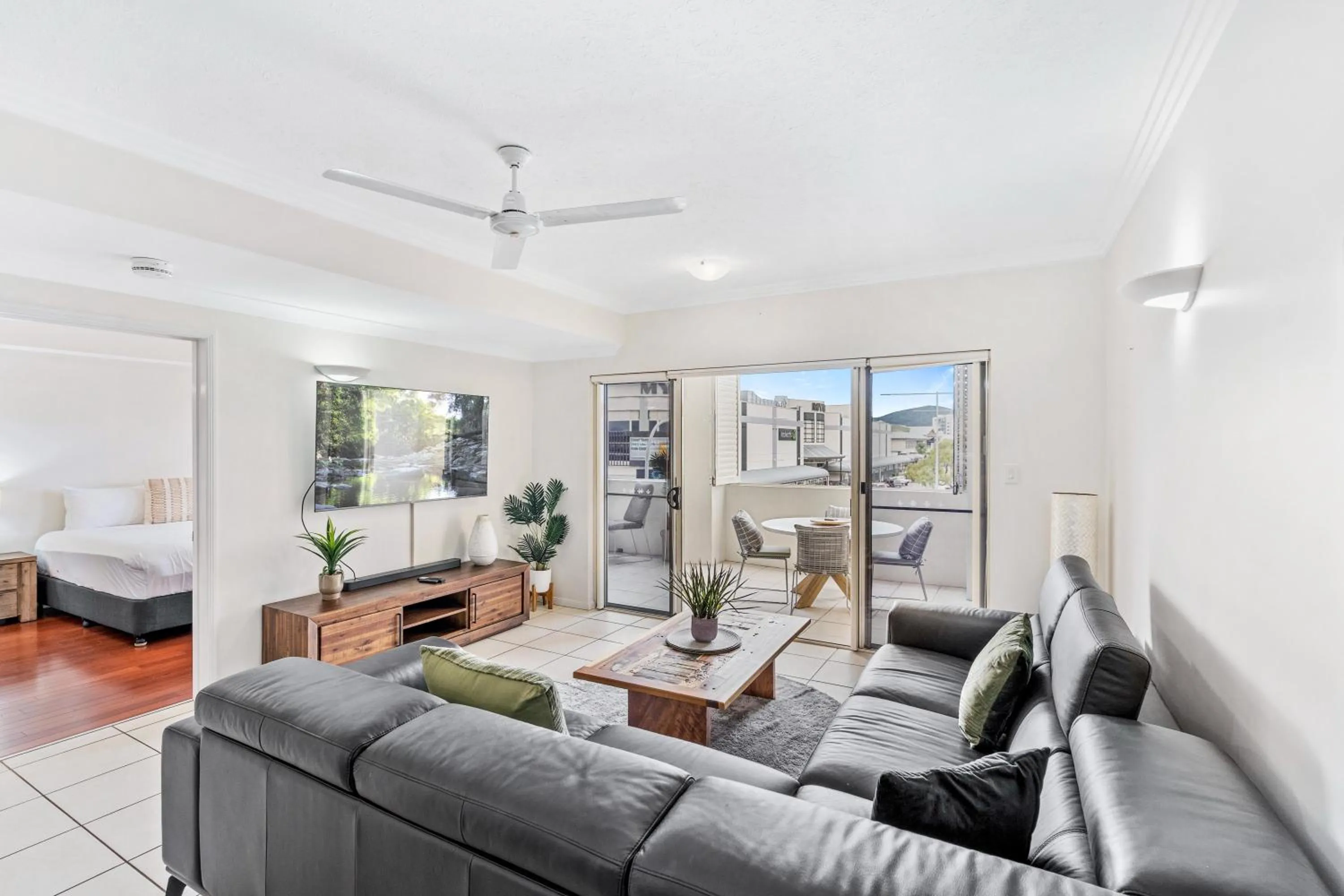 Living room, Bed in Cairns City Apartments
