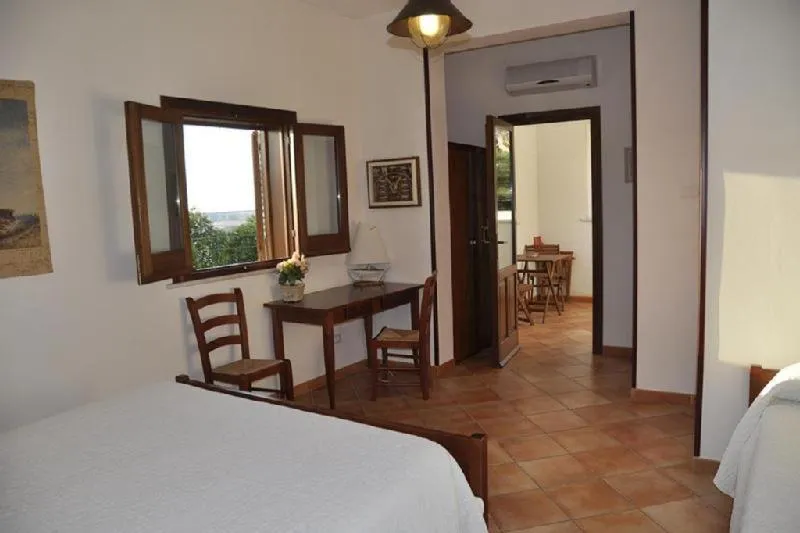 Bed in Punto de Vista B&B Makari