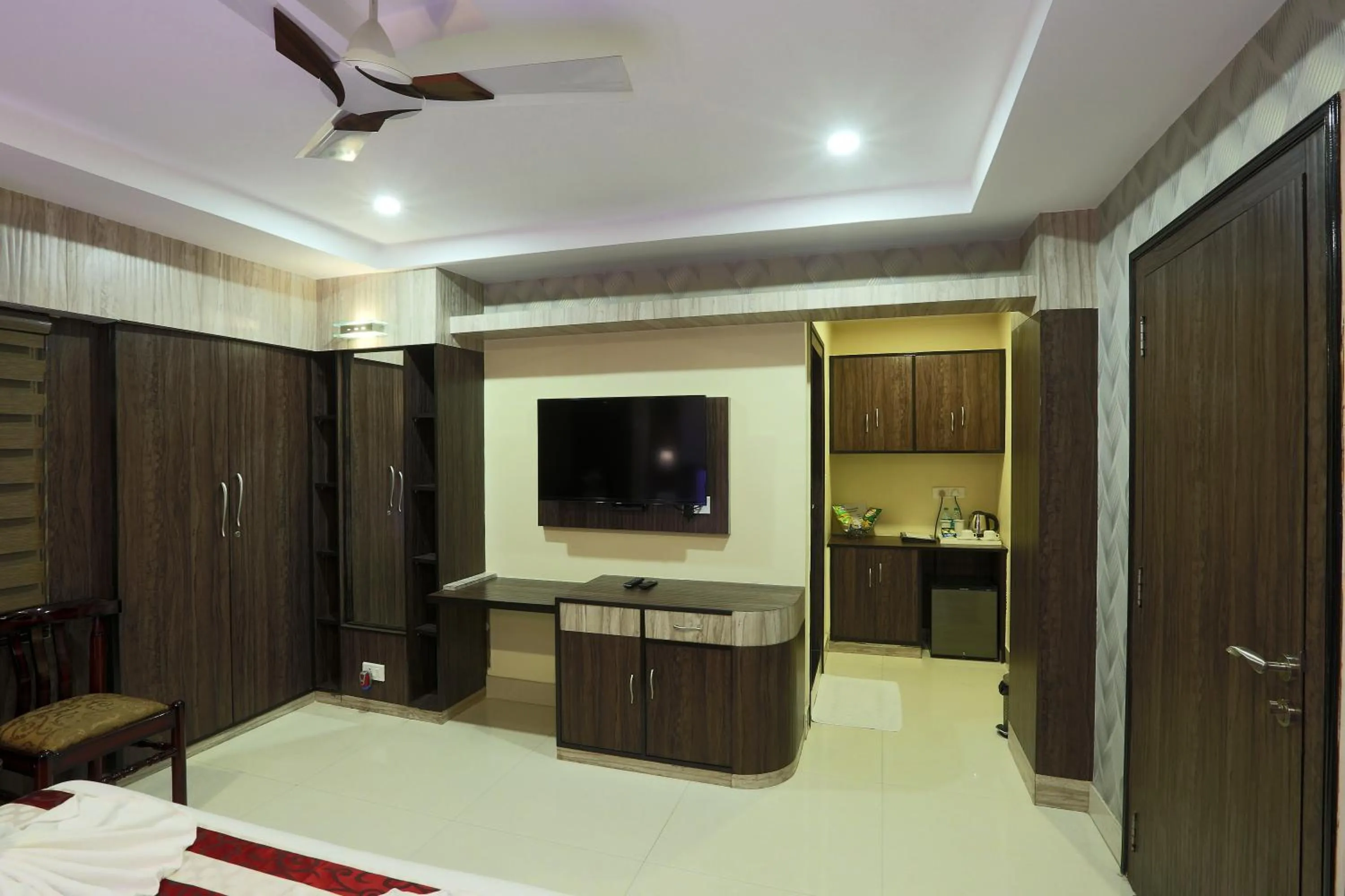 Communal lounge/ TV room in Hotel Blue Bird, Nagaon