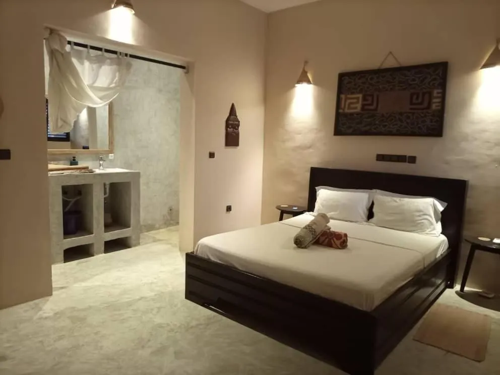 Bed in La Maison Bleue Lome