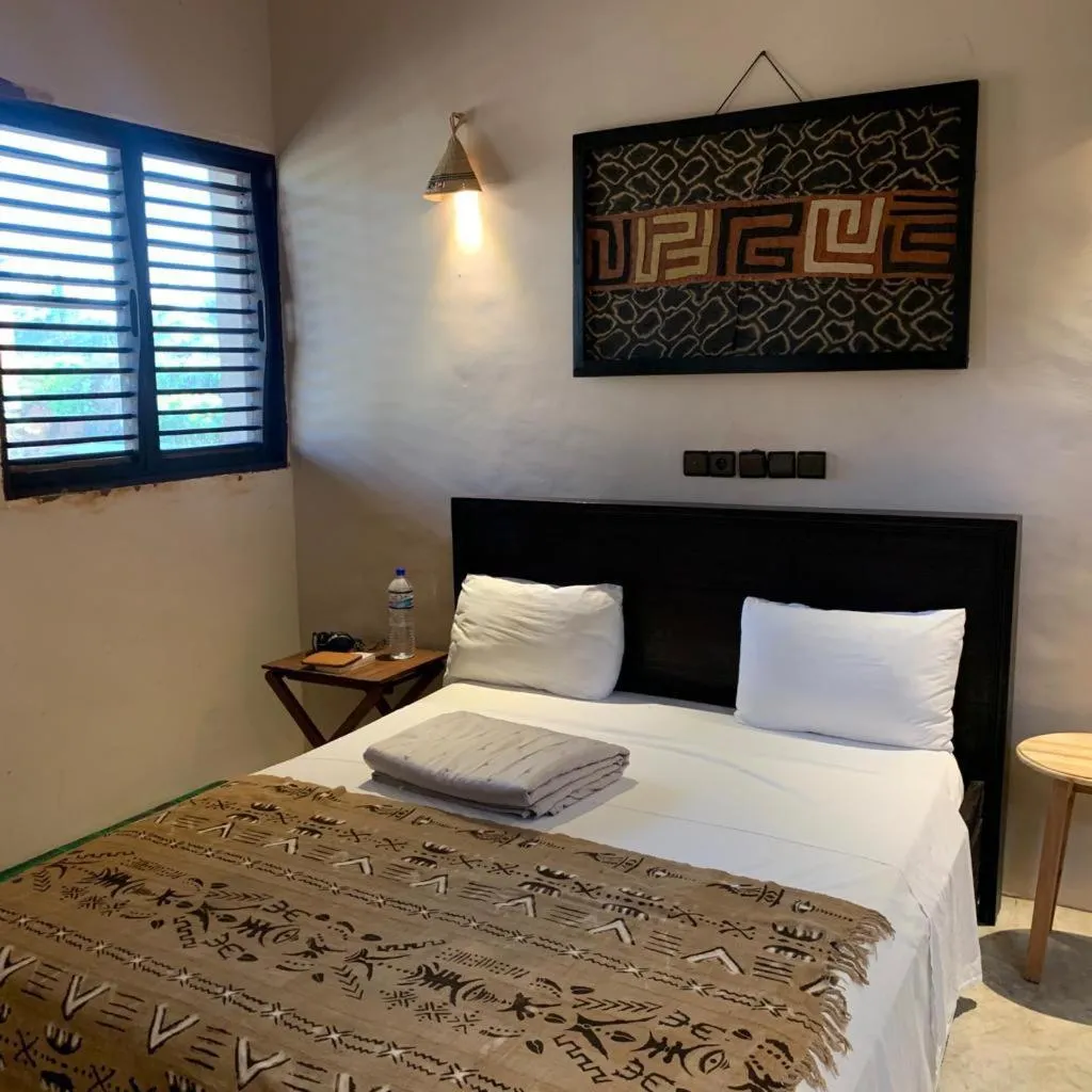 Bed in La Maison Bleue Lome