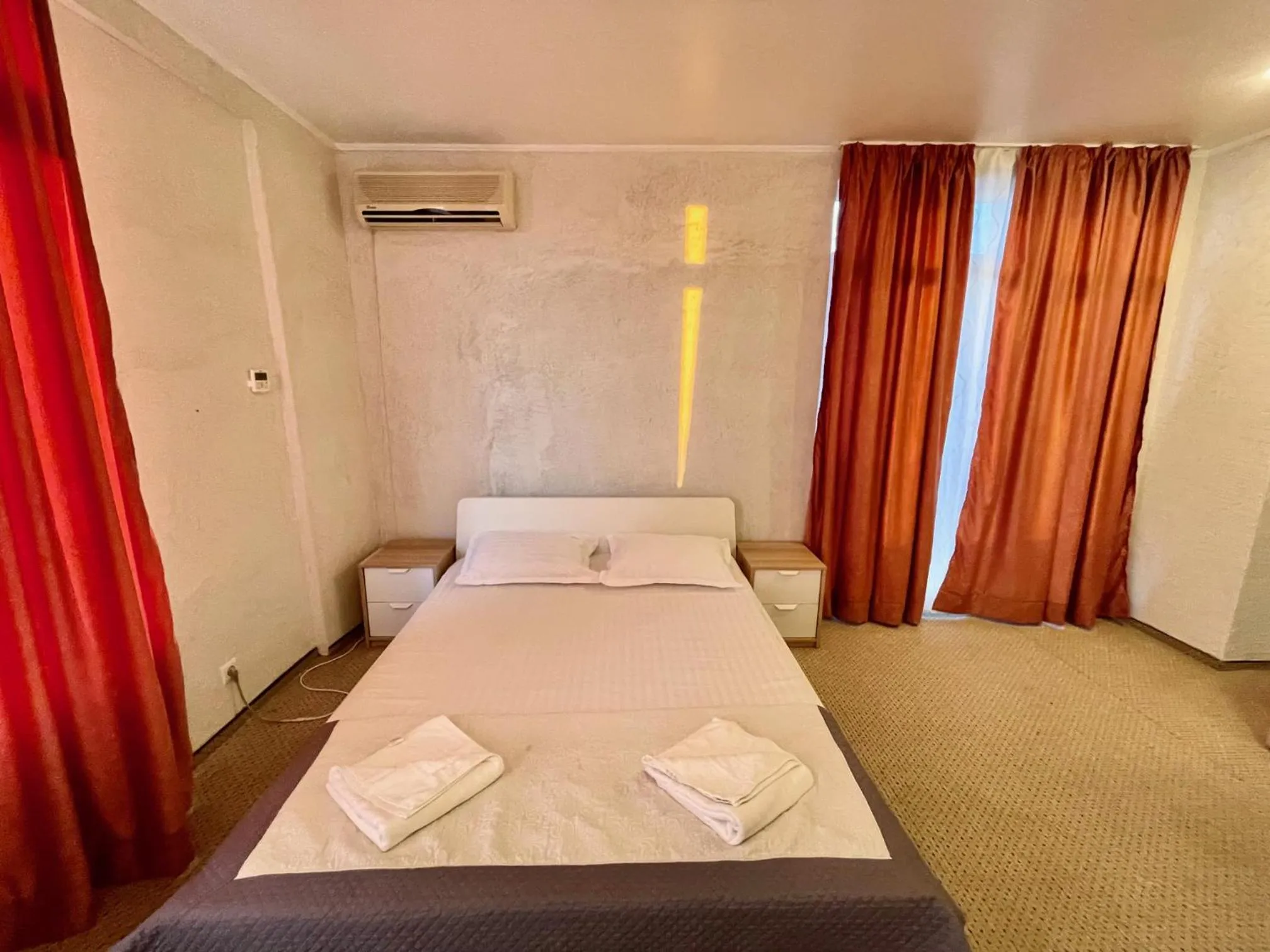 Bed in Hotel Mon Caprice