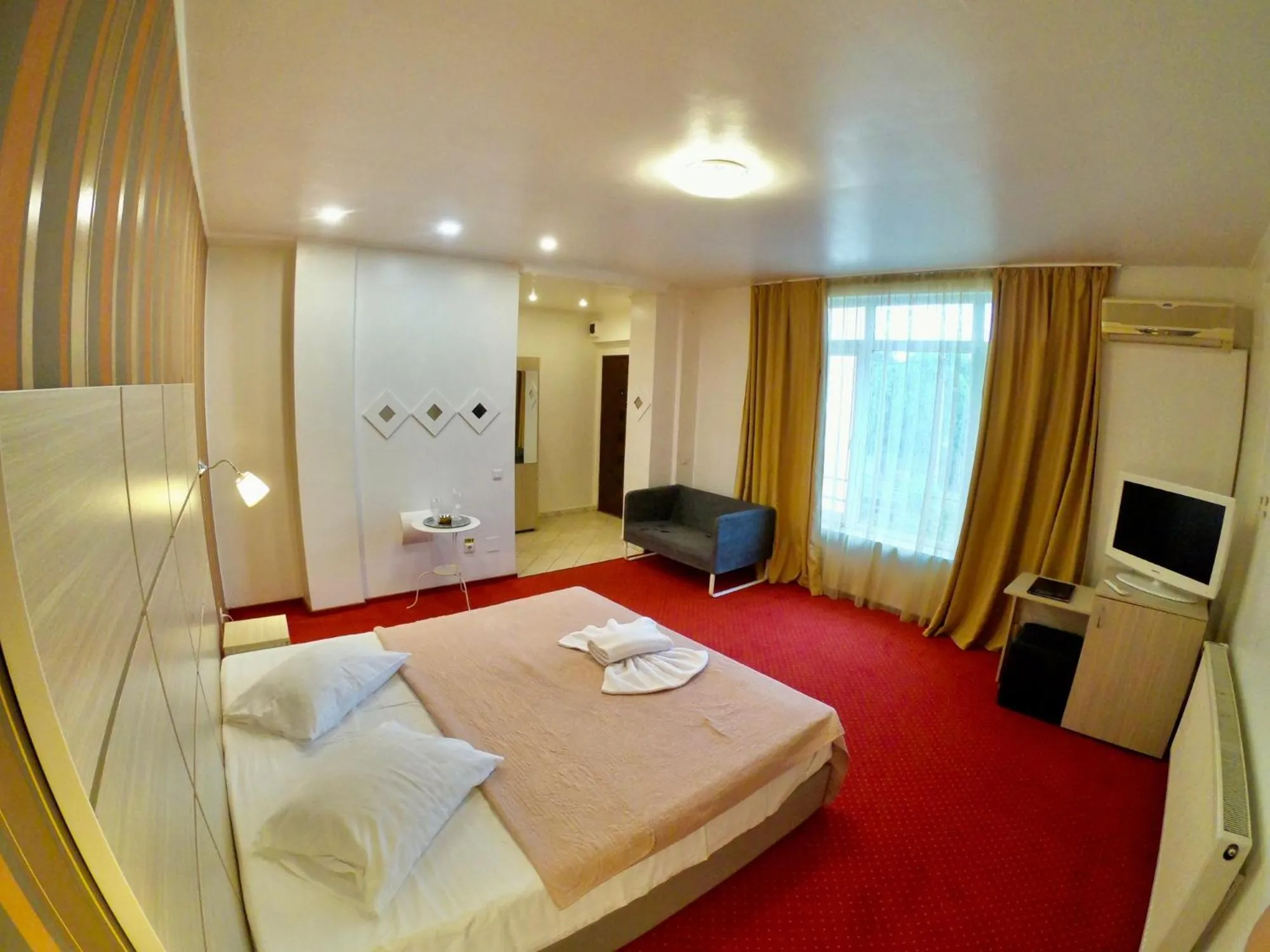 Bed in Hotel Mon Caprice