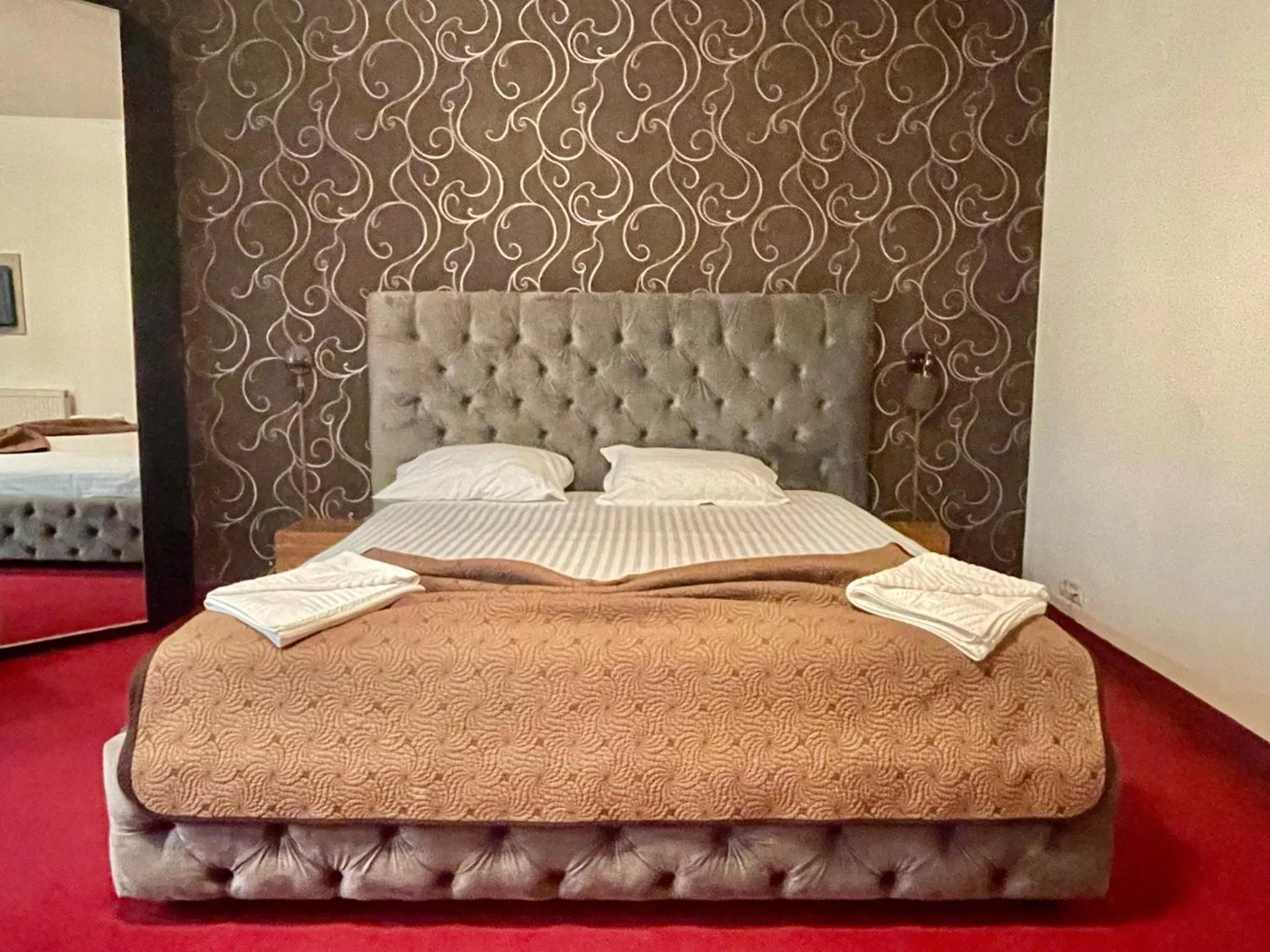 Bed in Hotel Mon Caprice