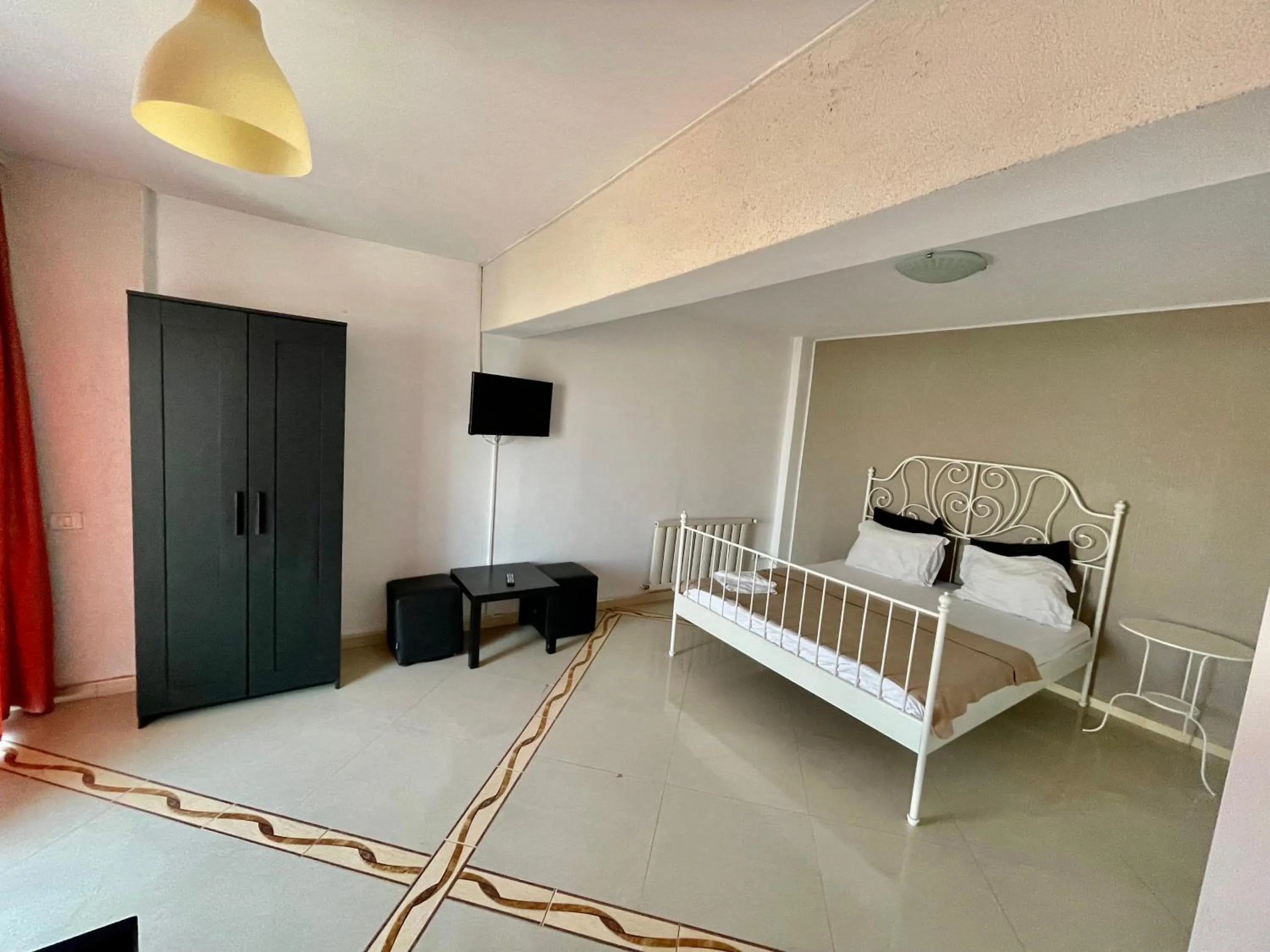 Bed in Hotel Mon Caprice