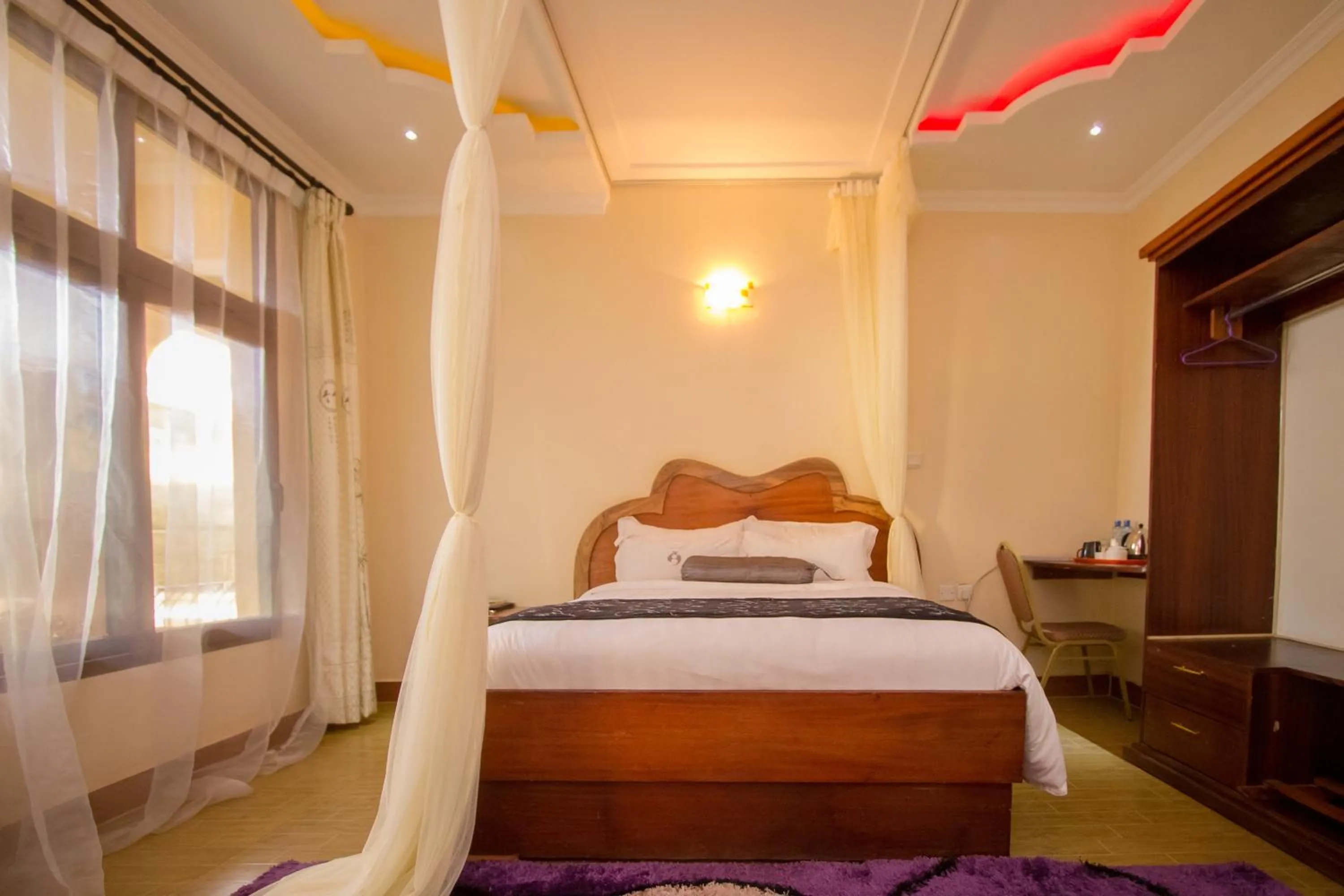 Bed in Aturukan Hotel