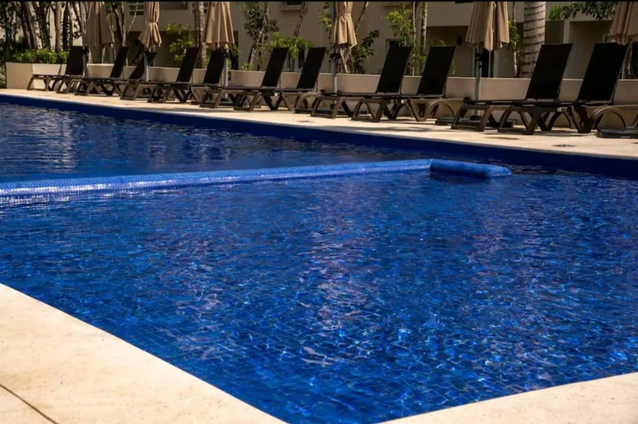 Swimming pool in Moderno Departamento Vacacional En Playa