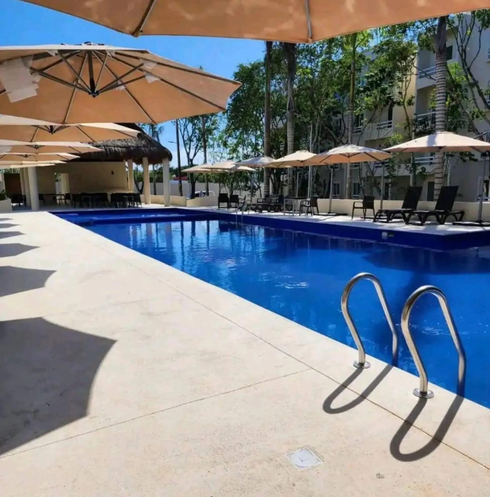 Swimming pool in Moderno Departamento Vacacional En Playa
