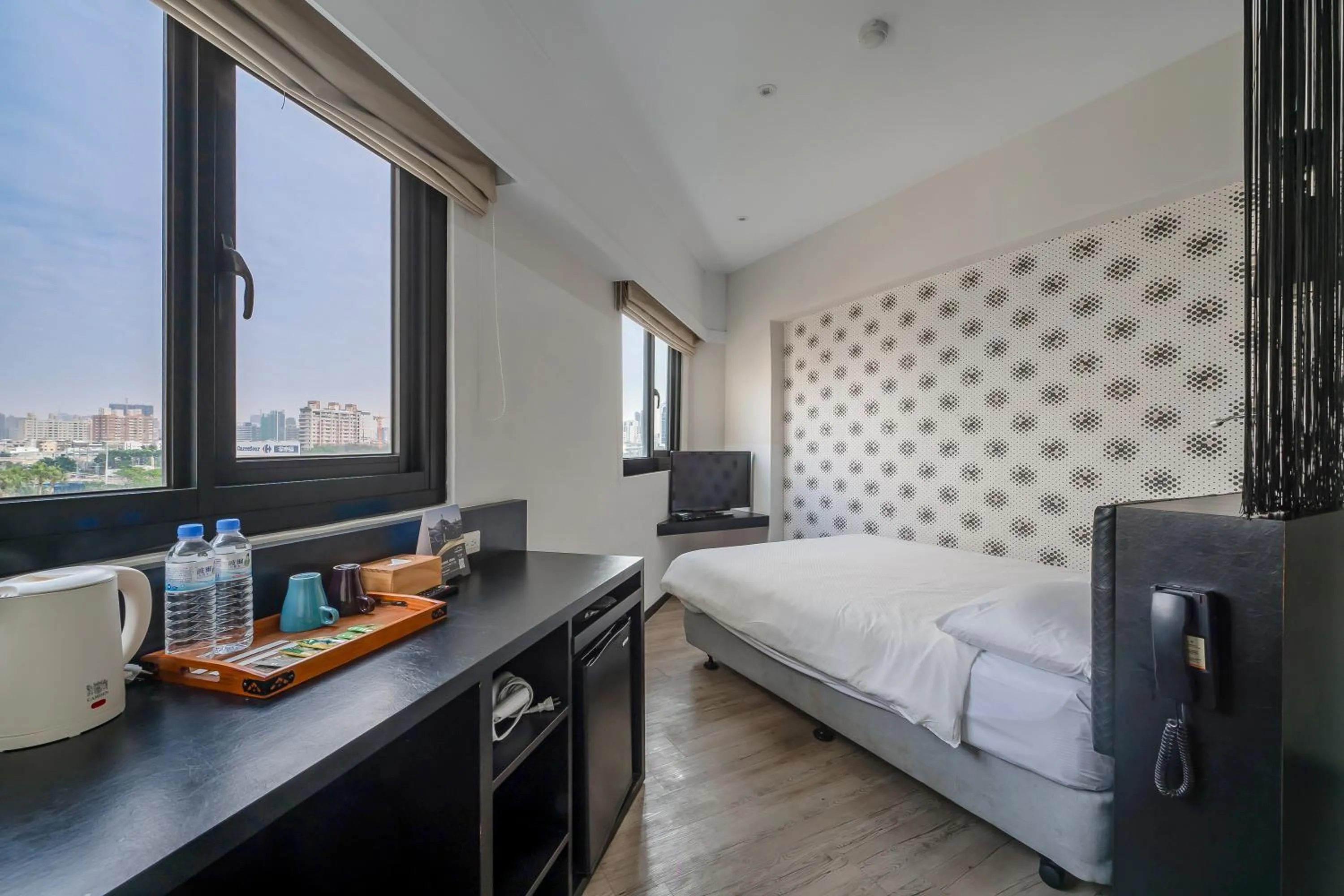 Bed in CHECK inn Express Kaohsiung Love River