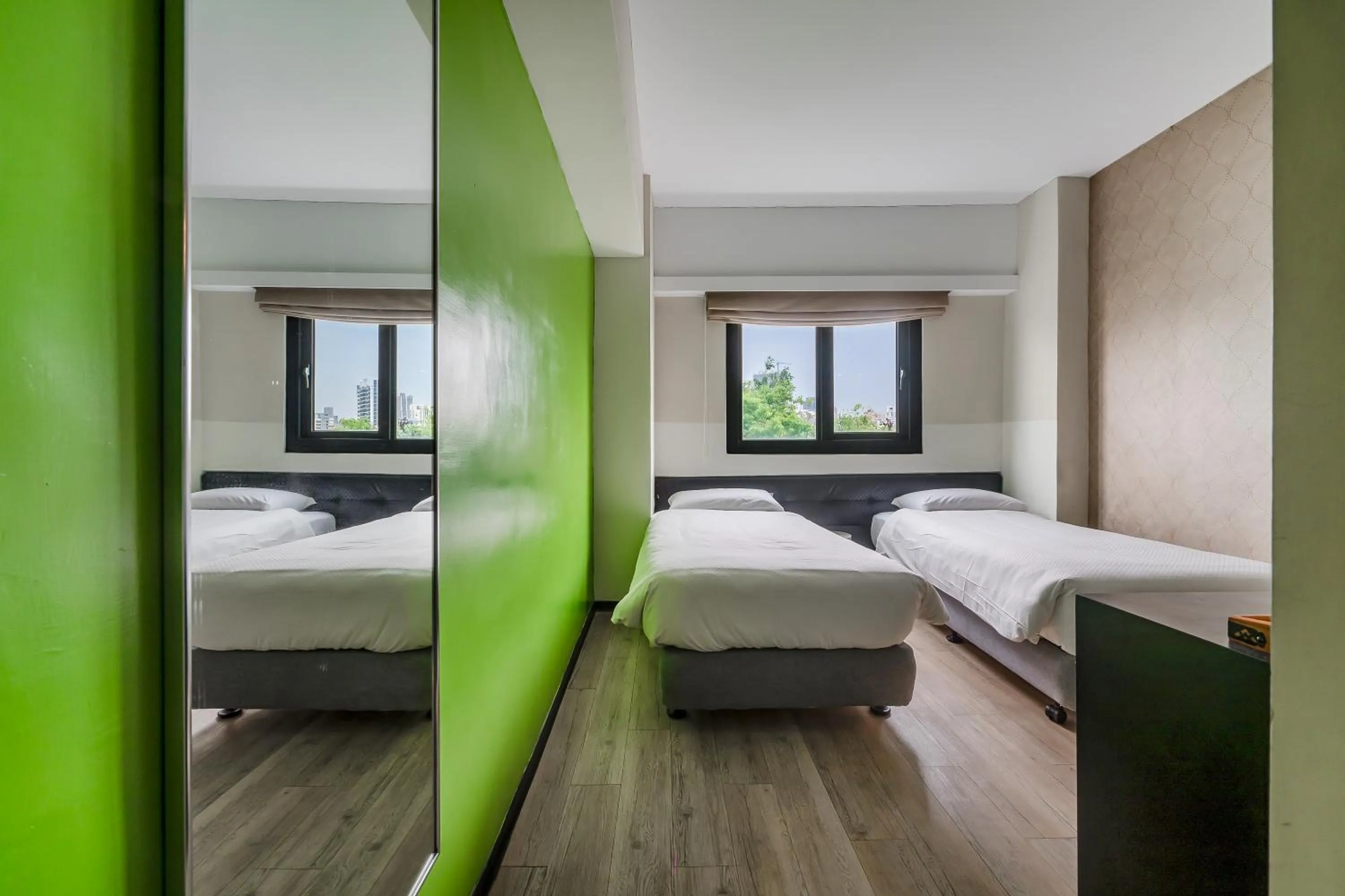 Bed in CHECK inn Express Kaohsiung Love River