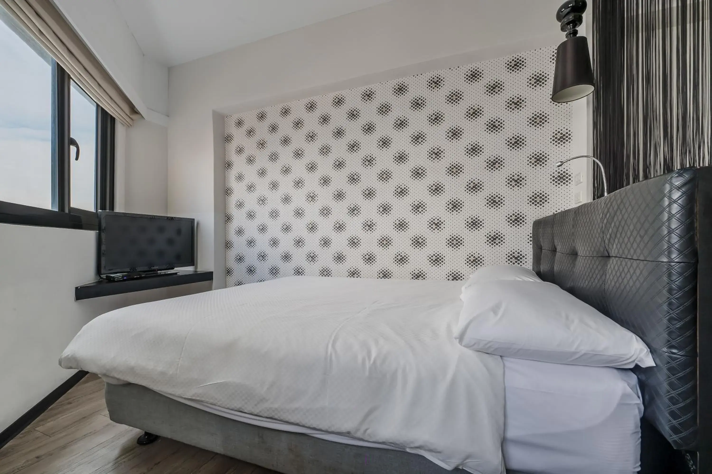 Bed in CHECK inn Express Kaohsiung Love River Bed in CHECK inn Express Kaohsiung Love River