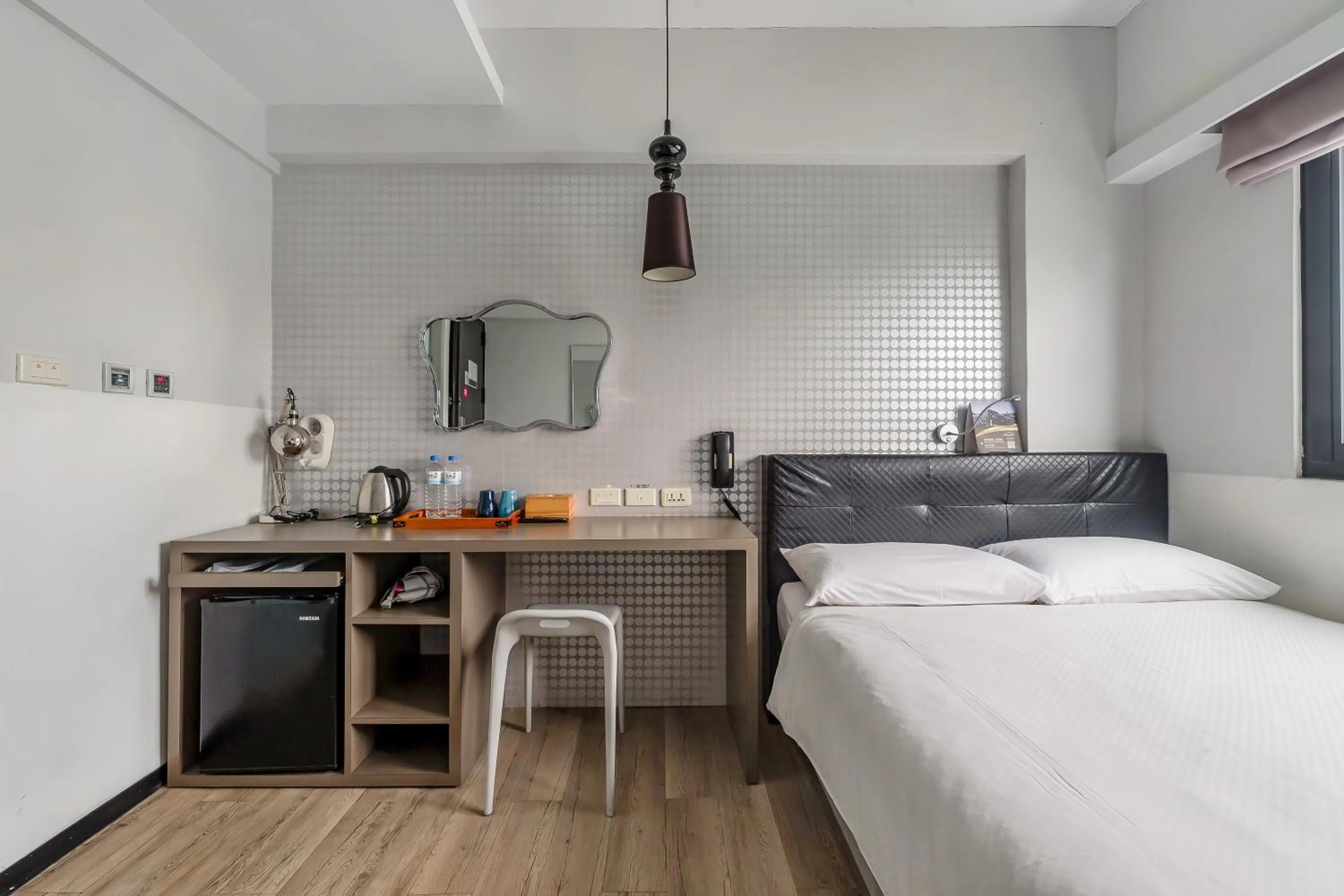 Bed in CHECK inn Express Kaohsiung Love River